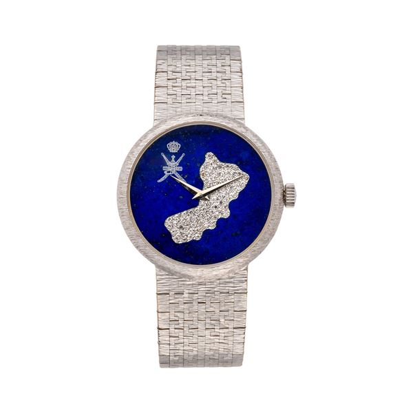 PIAGET - PIAGET - OROLOGIO A CARICA AUTOMATICA IN ORO BIANCO 18KT CON BRACCIALE INTEGRATO, QUADRANTE IN LAPISLAZZULI CON DISEGNO MAPPA OMAN IN DIAMANTI, LOGO OMAN AD ORE UNDICI.