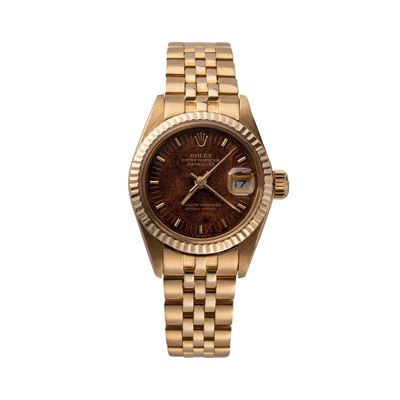 Datejust 6916, orologio da donna in oro giallo 18 kt con quadrante in radica (1978)