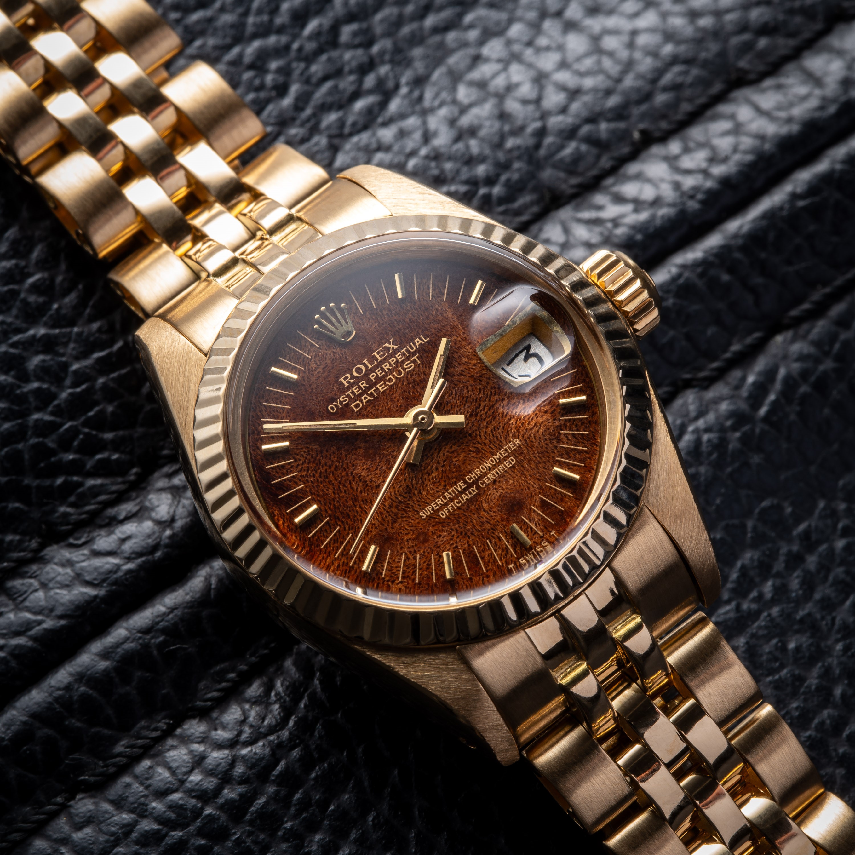 Rolex - Datejust 6916, orologio da donna in oro giallo 18 kt con quadrante in radica (1978)
