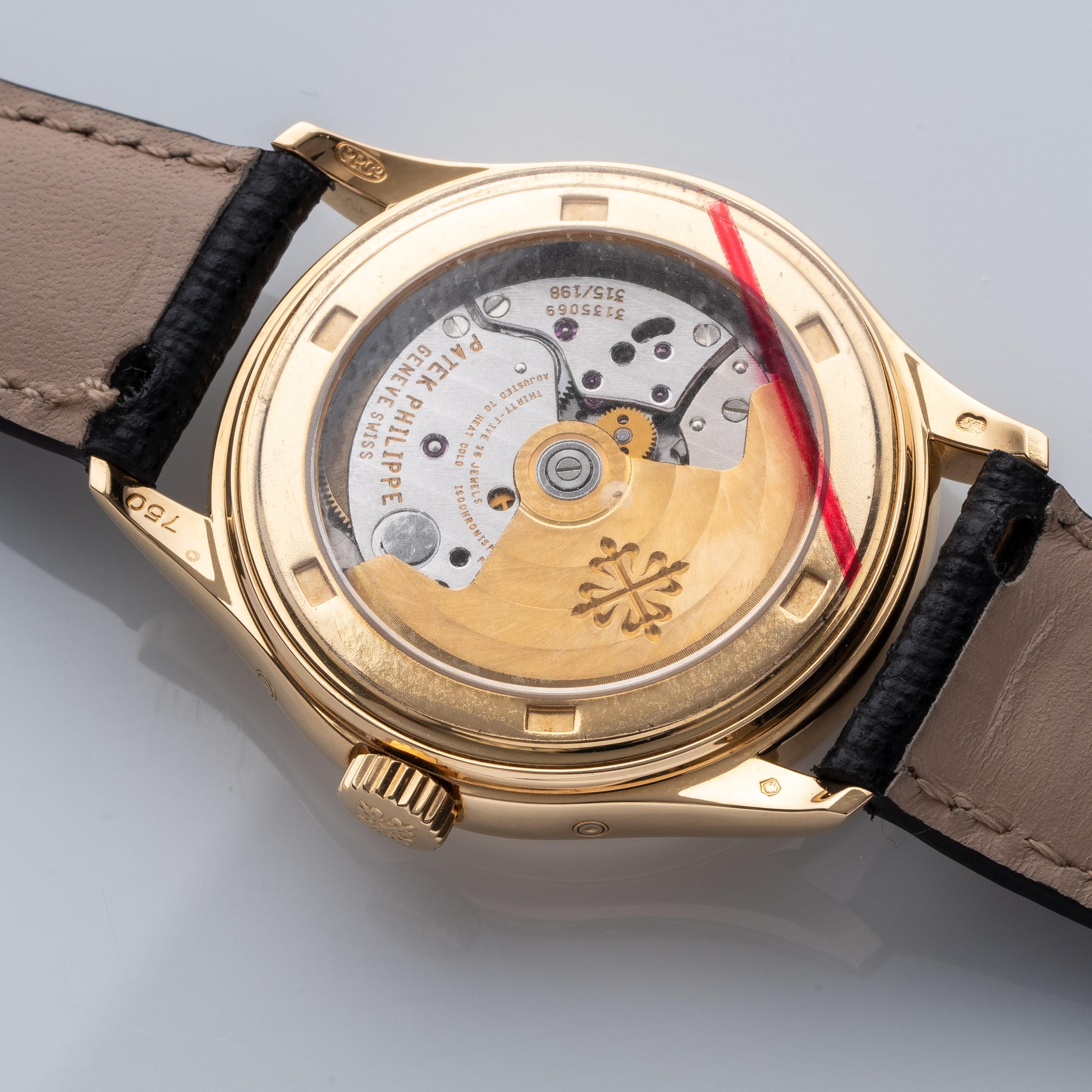 Patek Philippe - Calendario annuale ref. 5035 (2000) — orologio automatico in oro giallo 18 kt