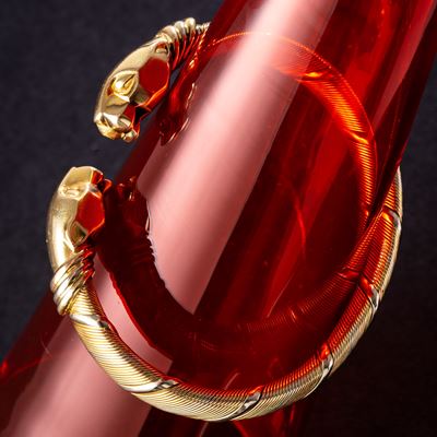Bracciale Cougar in oro giallo, rosso e bianco 18 kt