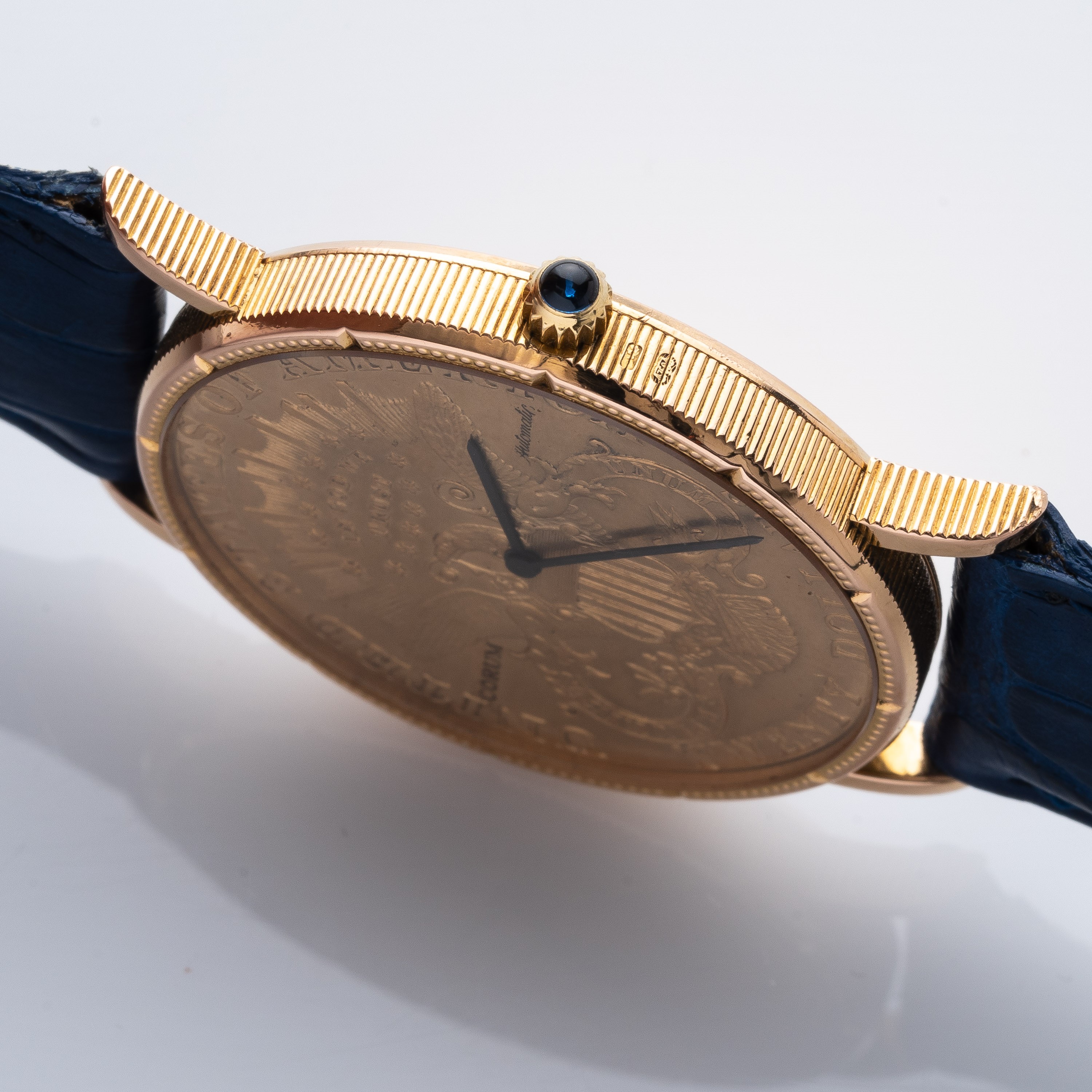 Corum - Orologio “20 Dollari” in oro giallo 18 kt, quadrante con moneta (Ref. 8869)