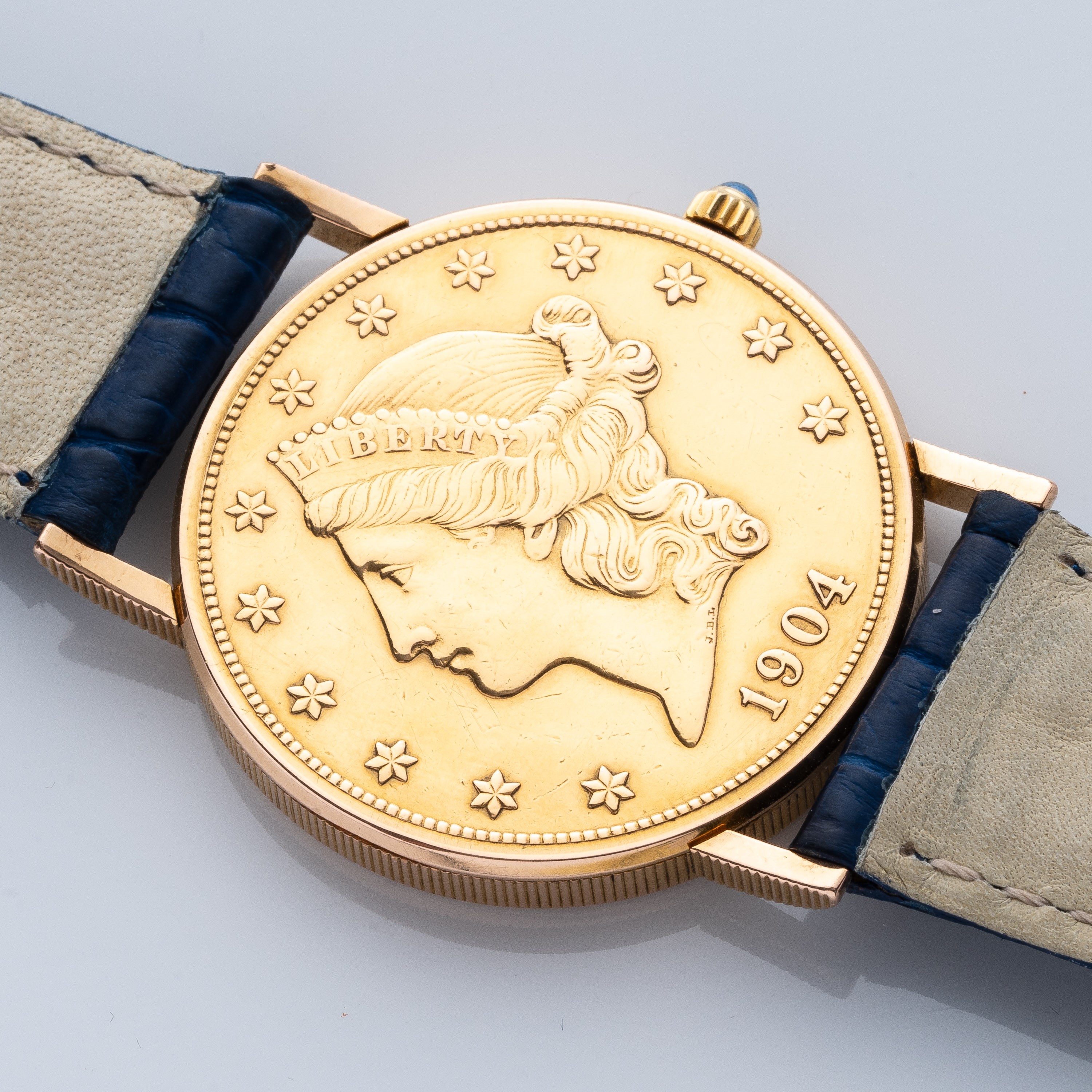 Corum - Orologio “20 Dollari” in oro giallo 18 kt, quadrante con moneta (Ref. 8869)