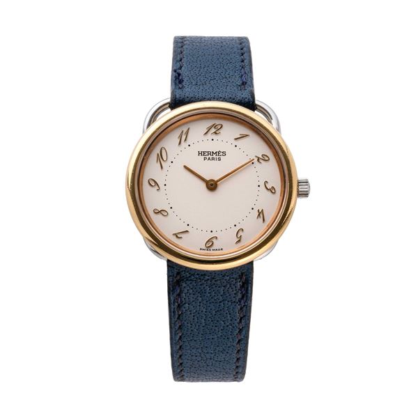 HERMÈS - HERMES - ARCEAU OROLOGIO DA DONNA SOLO TEMPO IN ACCIAIO CON GHIERA IN ORO 18KT.