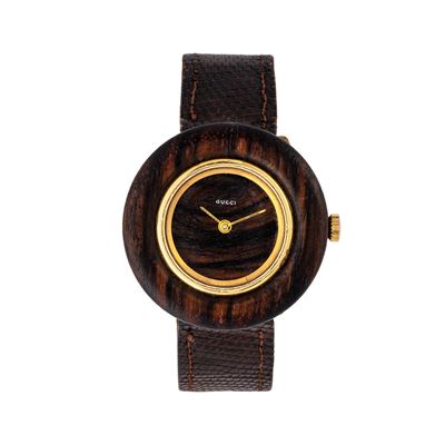 Disco volante, orologio solo tempo in oro giallo 18 kt e radica
