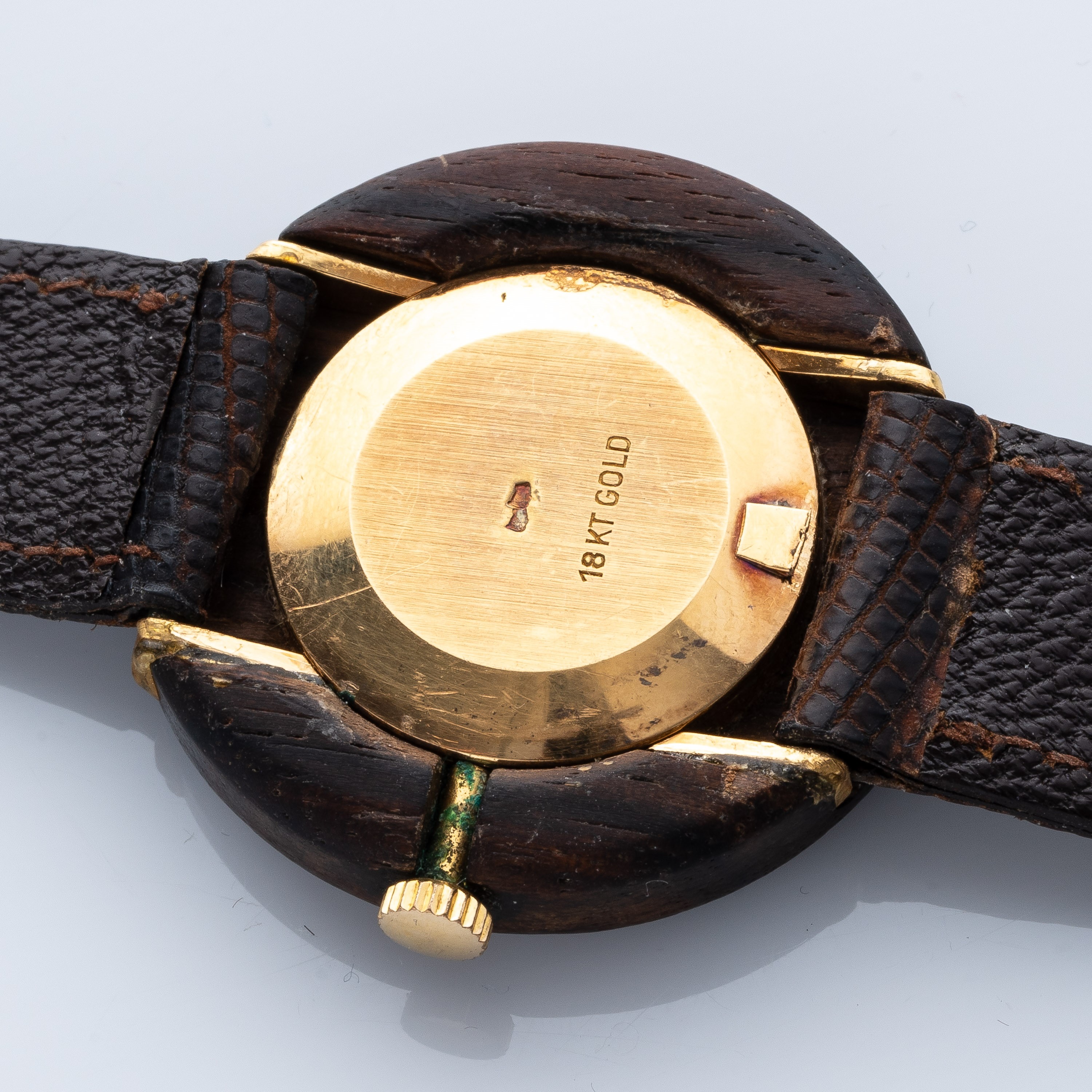Gucci - Disco volante, orologio solo tempo in oro giallo 18 kt e radica