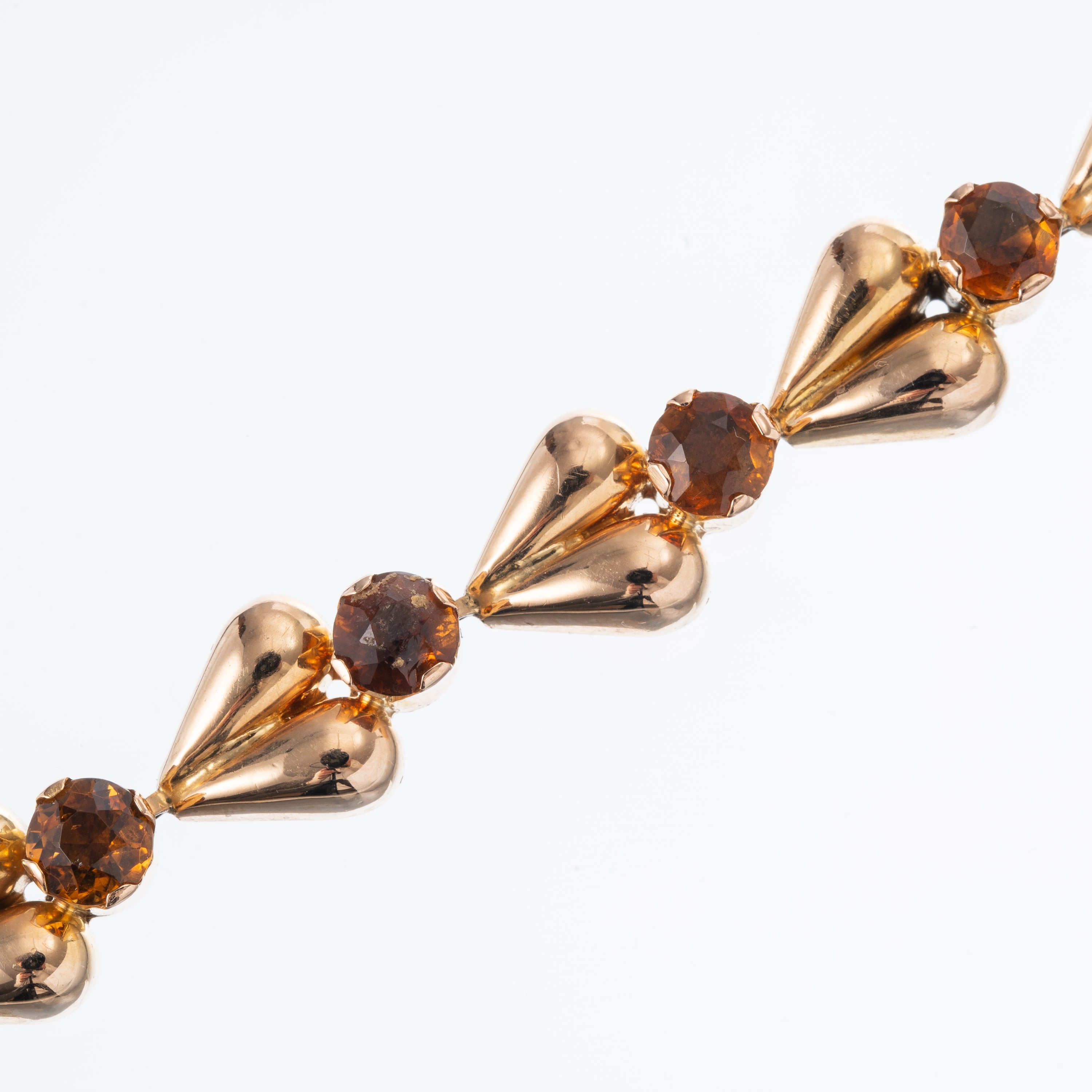 Collana e bracciale stampati vuoti in oro 18 kt, con quarzi citrini