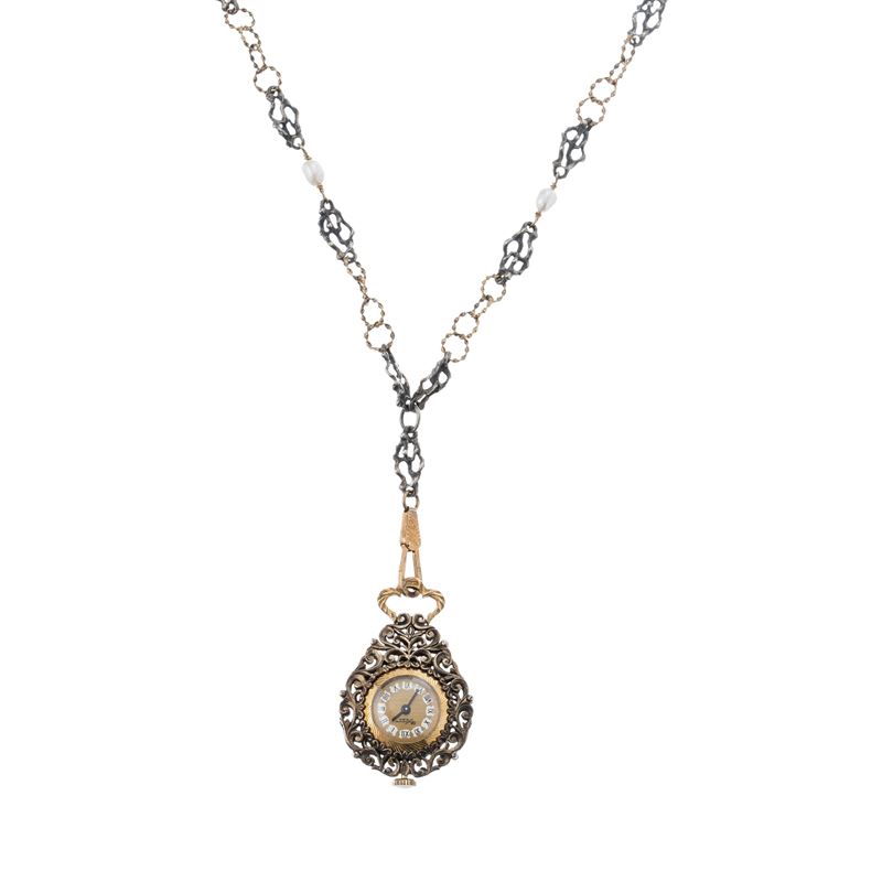Orologio con catena in oro e argento, perline e ciondolo