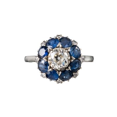 Anello in oro bianco 18 kt con diamante e otto zaffiri