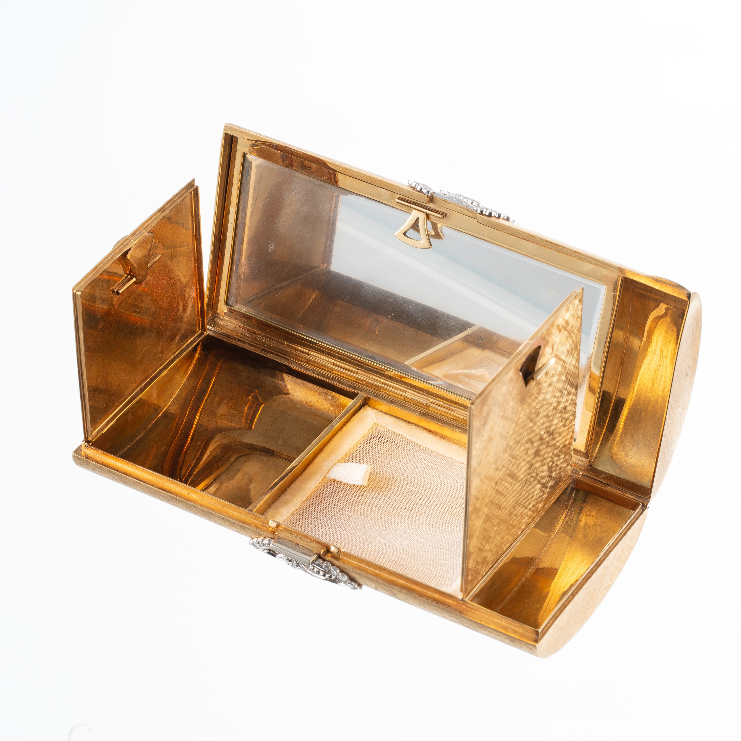 Pochette in oro 18 kt con diamanti, completa di pettine, specchio e comparto cipria