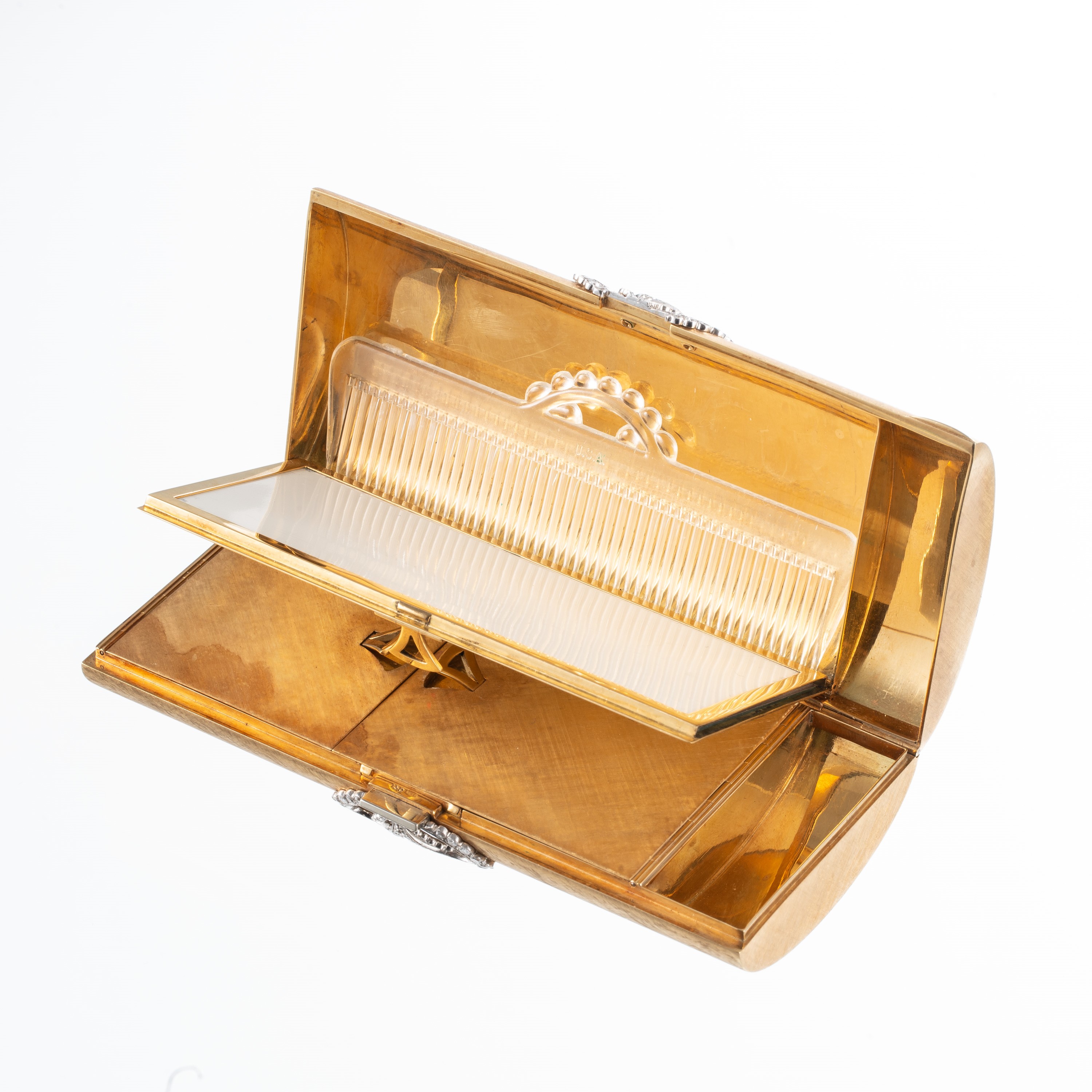 Pochette in oro 18 kt con diamanti, completa di pettine, specchio e comparto cipria