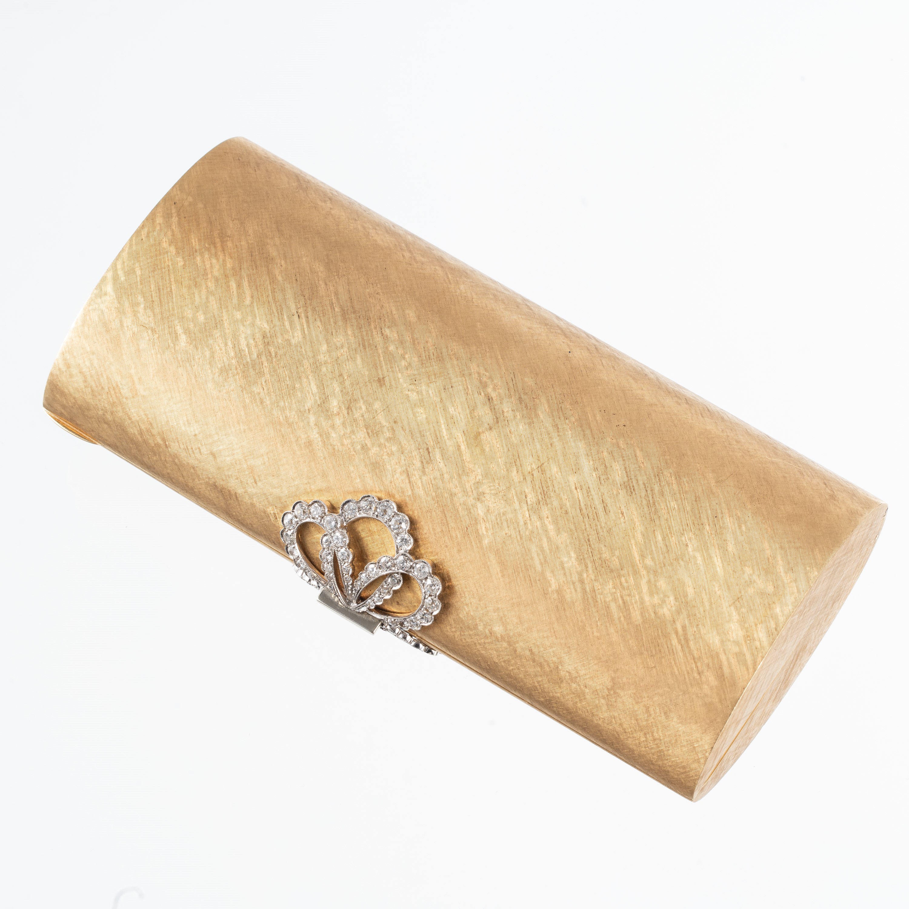 Pochette in oro 18 kt con diamanti, completa di pettine, specchio e comparto cipria