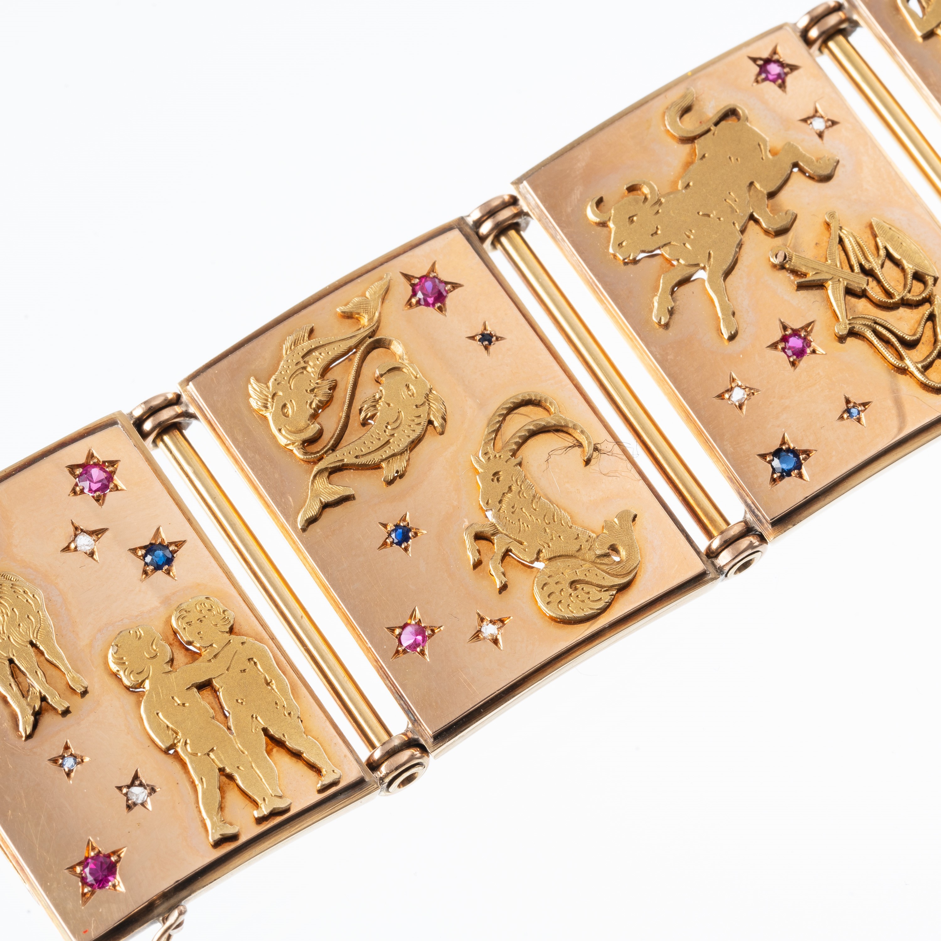 Leo Zoratti, Bracciale in oro 18 kt con segni zodiacali, zaffiri, rubini e diamanti (1936)