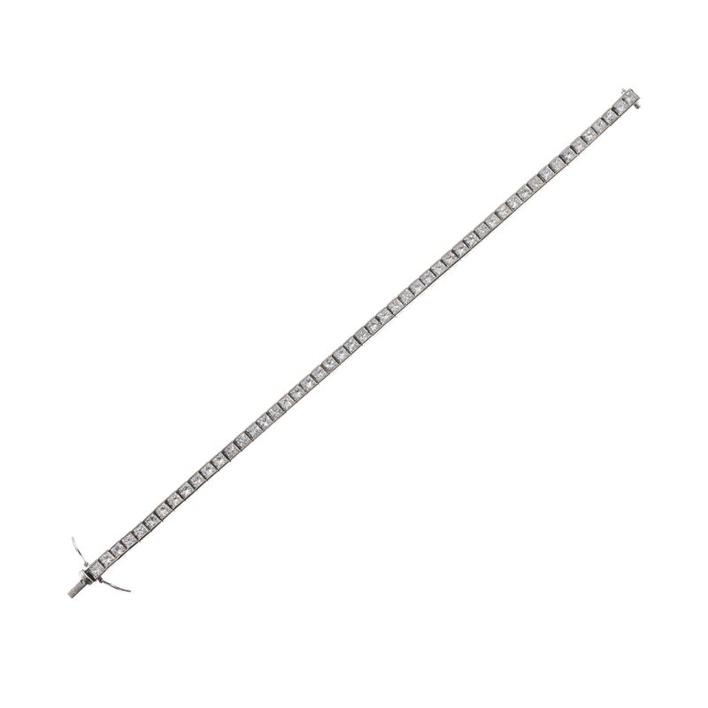 Bracciale tennis in oro bianco 18 kt con diamanti carré incolori