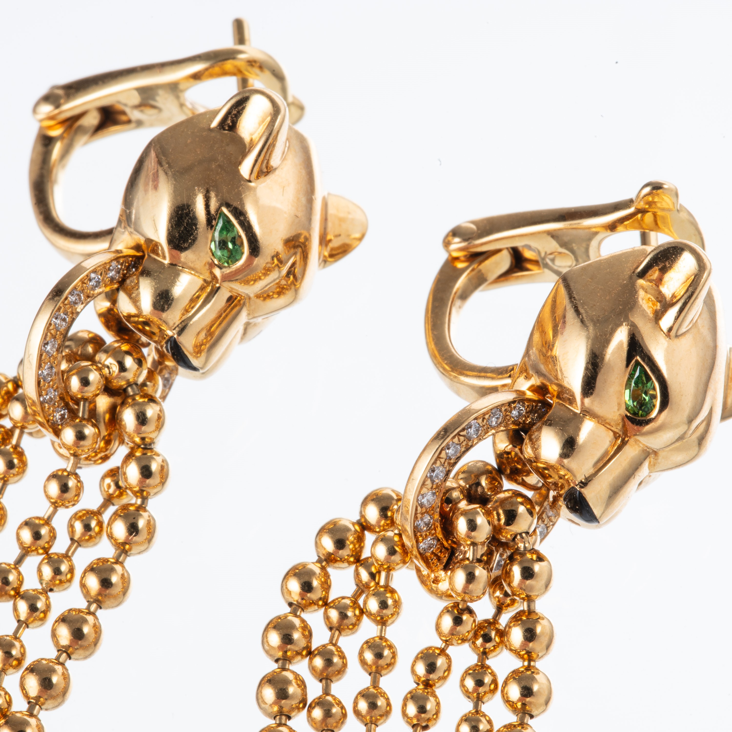 Cartier - Orecchini a motivo pantera in oro giallo 18 kt con tsavorite