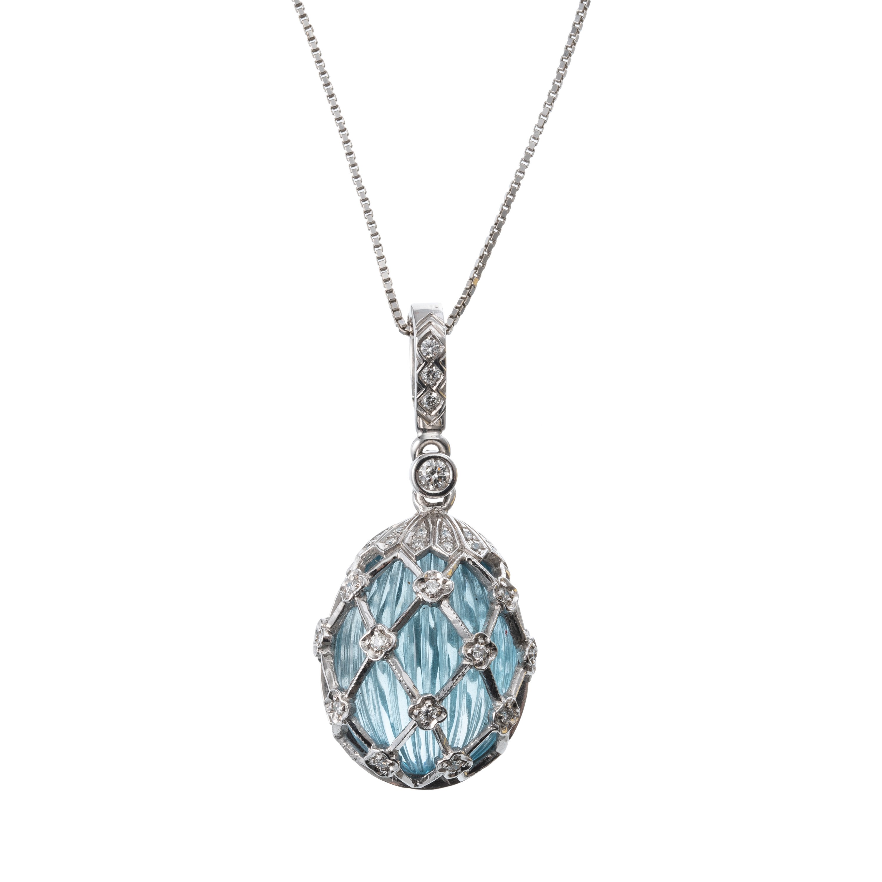 Ciondolo con catena in oro bianco 18 kt, topazio azzurro scanalato e brillanti