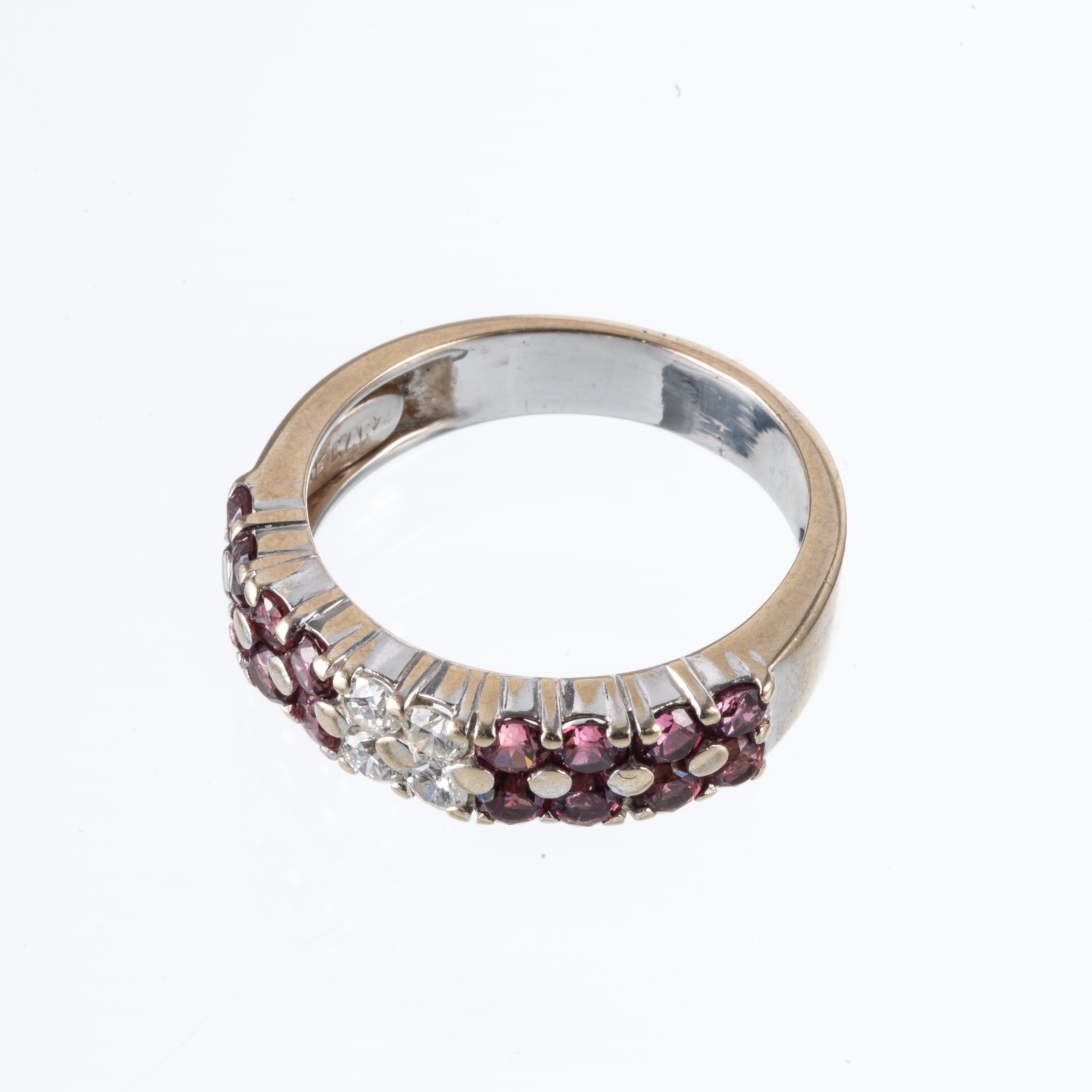 Coppia di anelli, oro bianco 18 kt con brillanti e tormaline rosa
