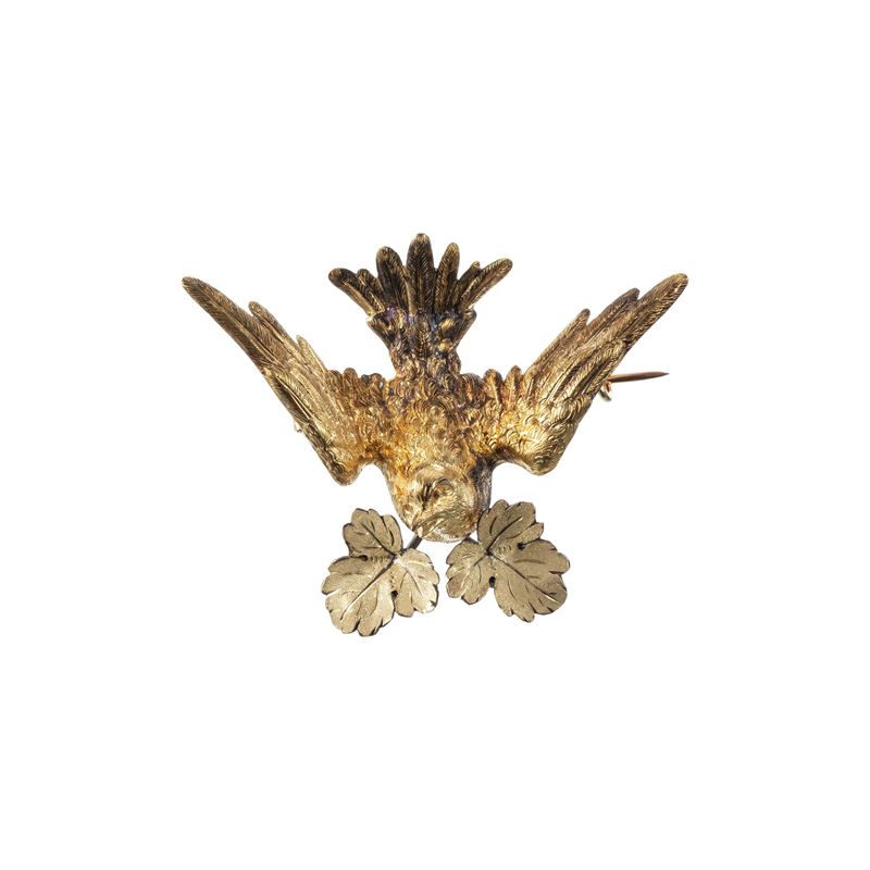 Spilla/Ciondolo, uccello di scuola fiorentina, oro giallo 18 kt finemente sbalzato e inciso