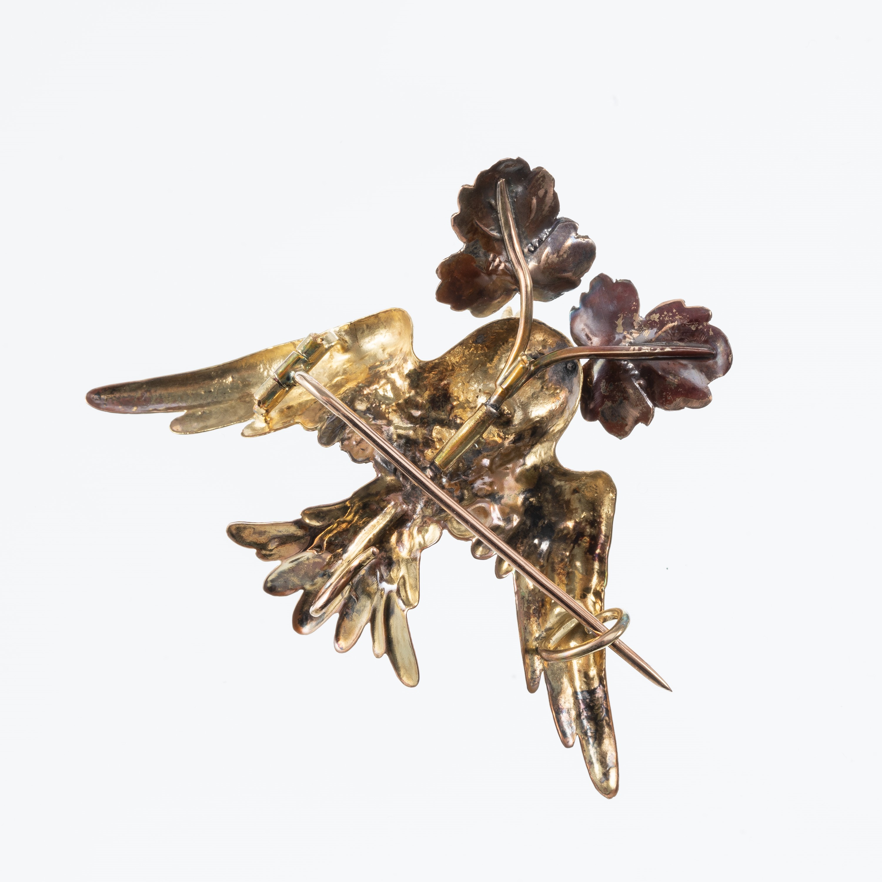 Spilla/Ciondolo, uccello di scuola fiorentina, oro giallo 18 kt finemente sbalzato e inciso