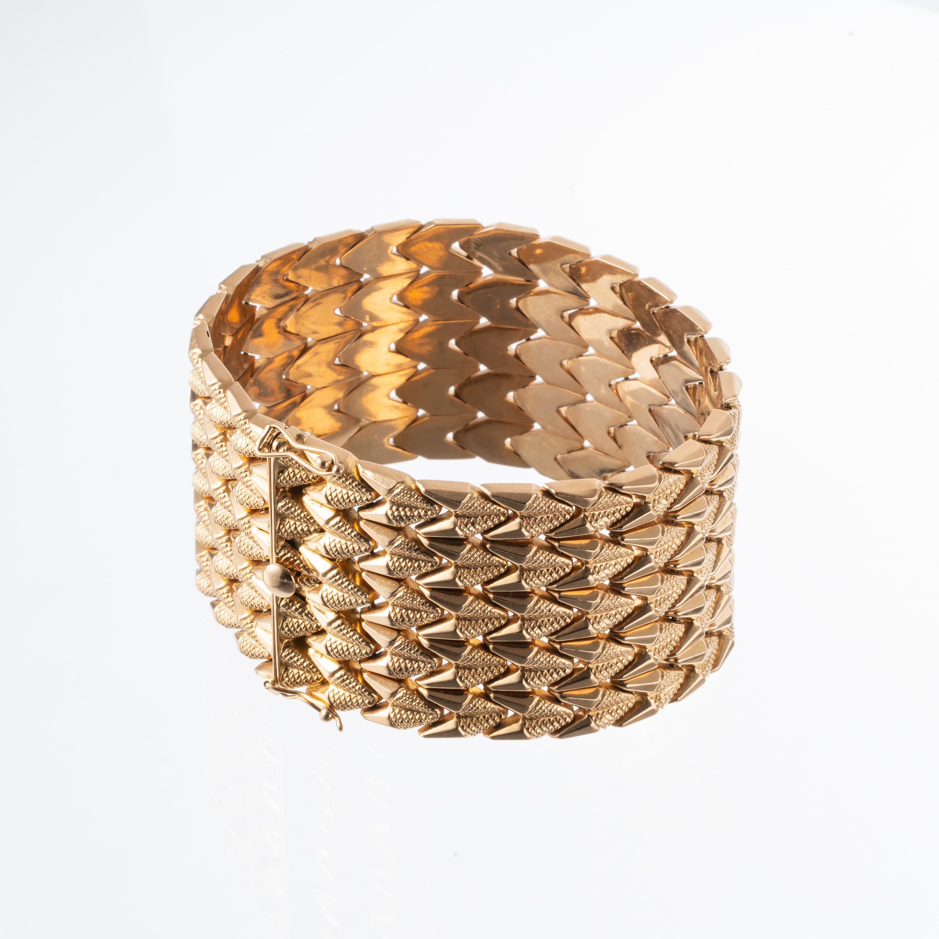 Bracciale in oro 18 kt con elementi stampati