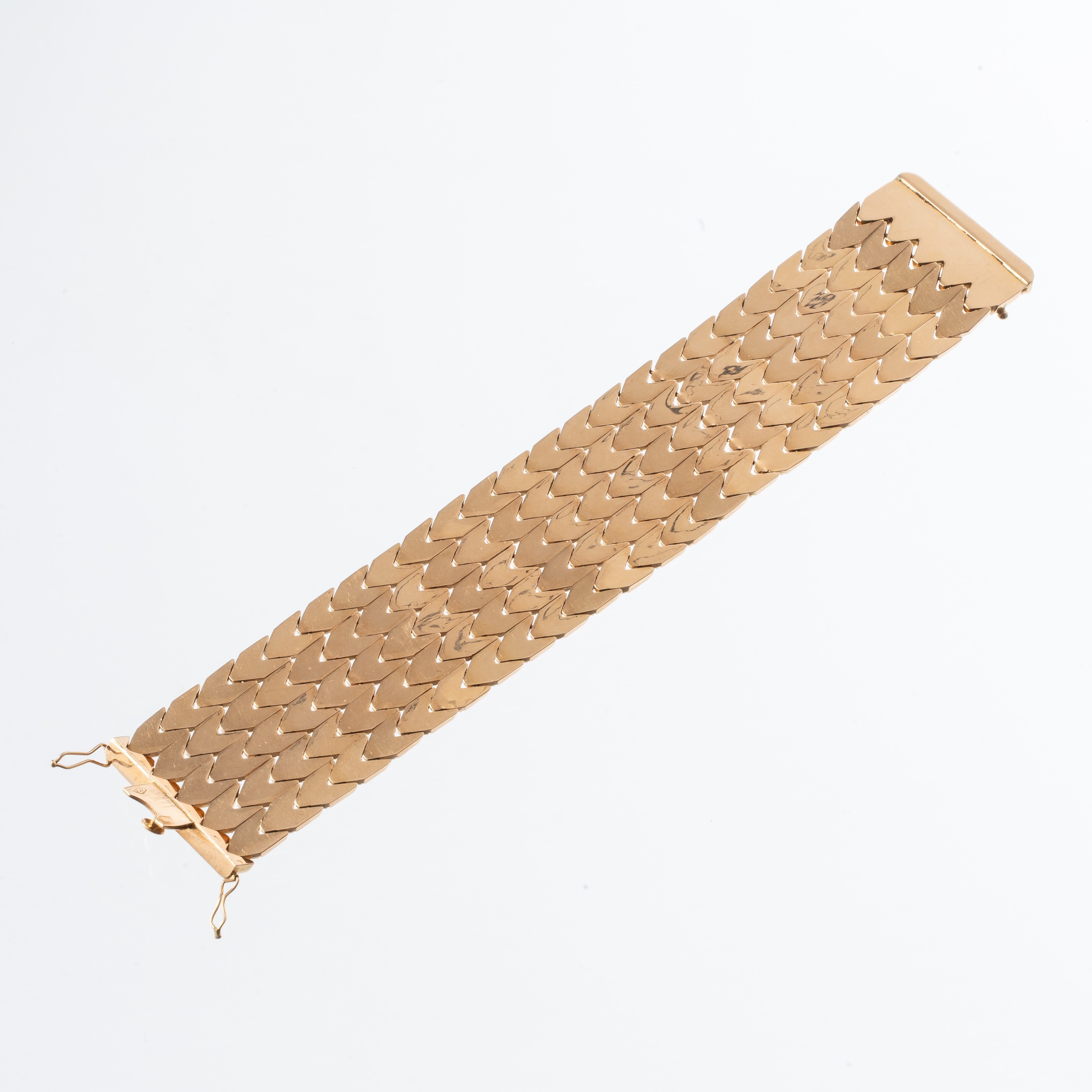 Bracciale in oro 18 kt con elementi stampati