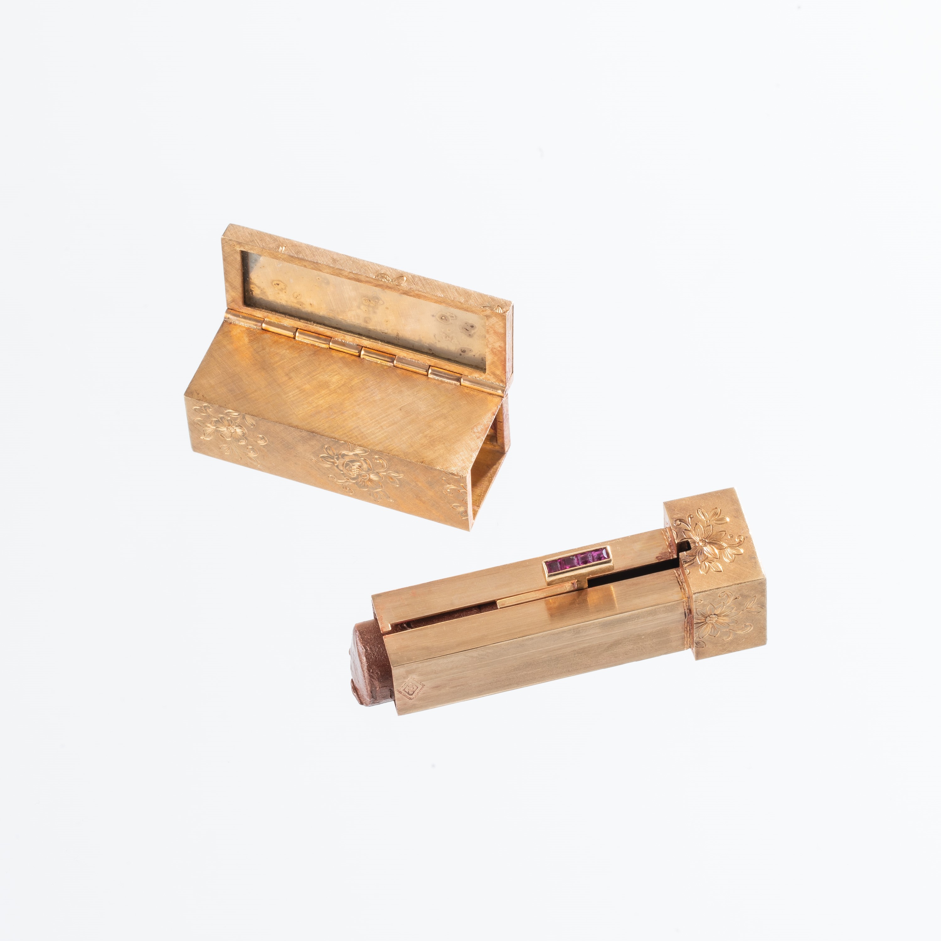 Porta cipria e porta rossetto, Oro giallo 18 kt con rubini