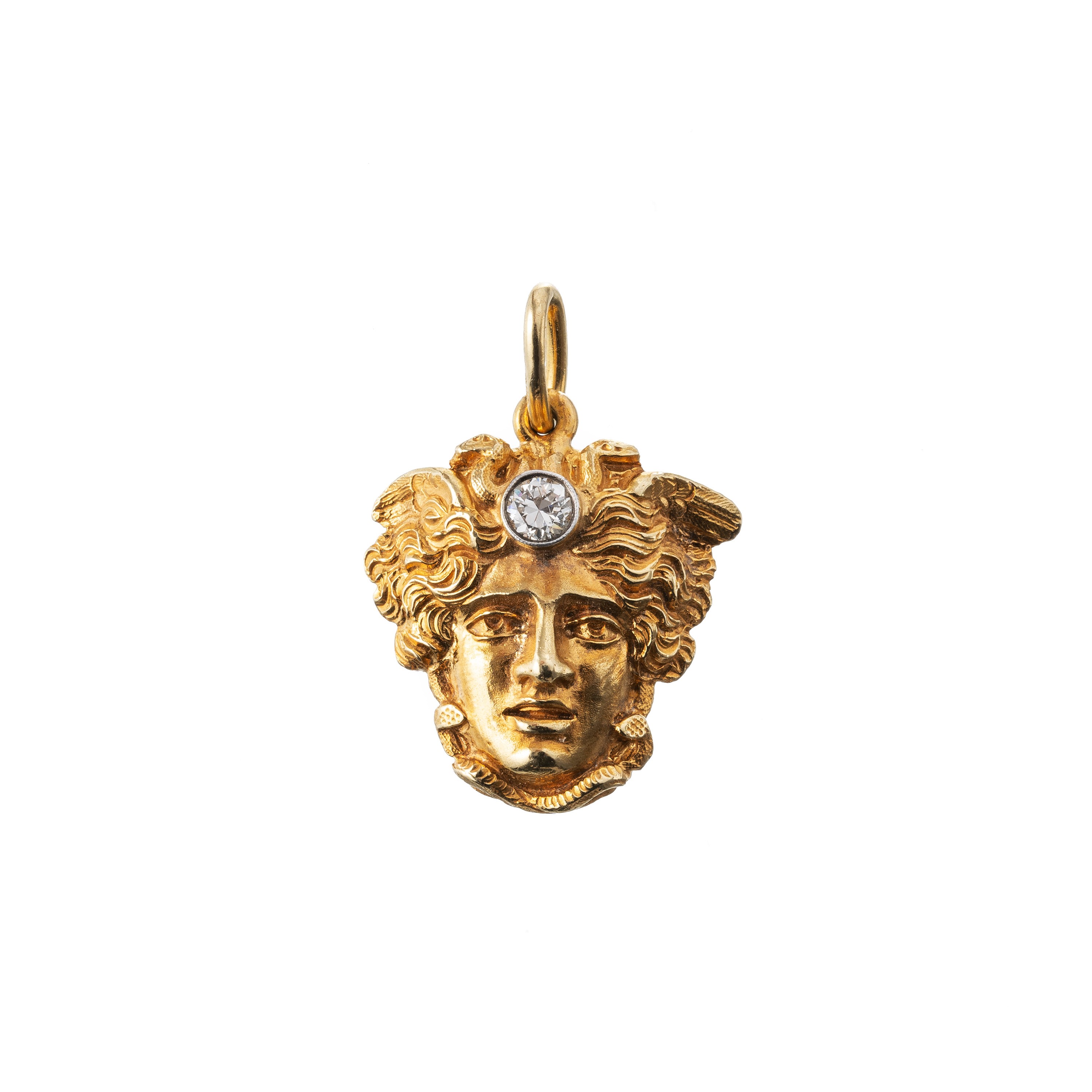 Ciondolo in oro giallo 18 kt con testa di Medusa e diamante ct 0,18 circa