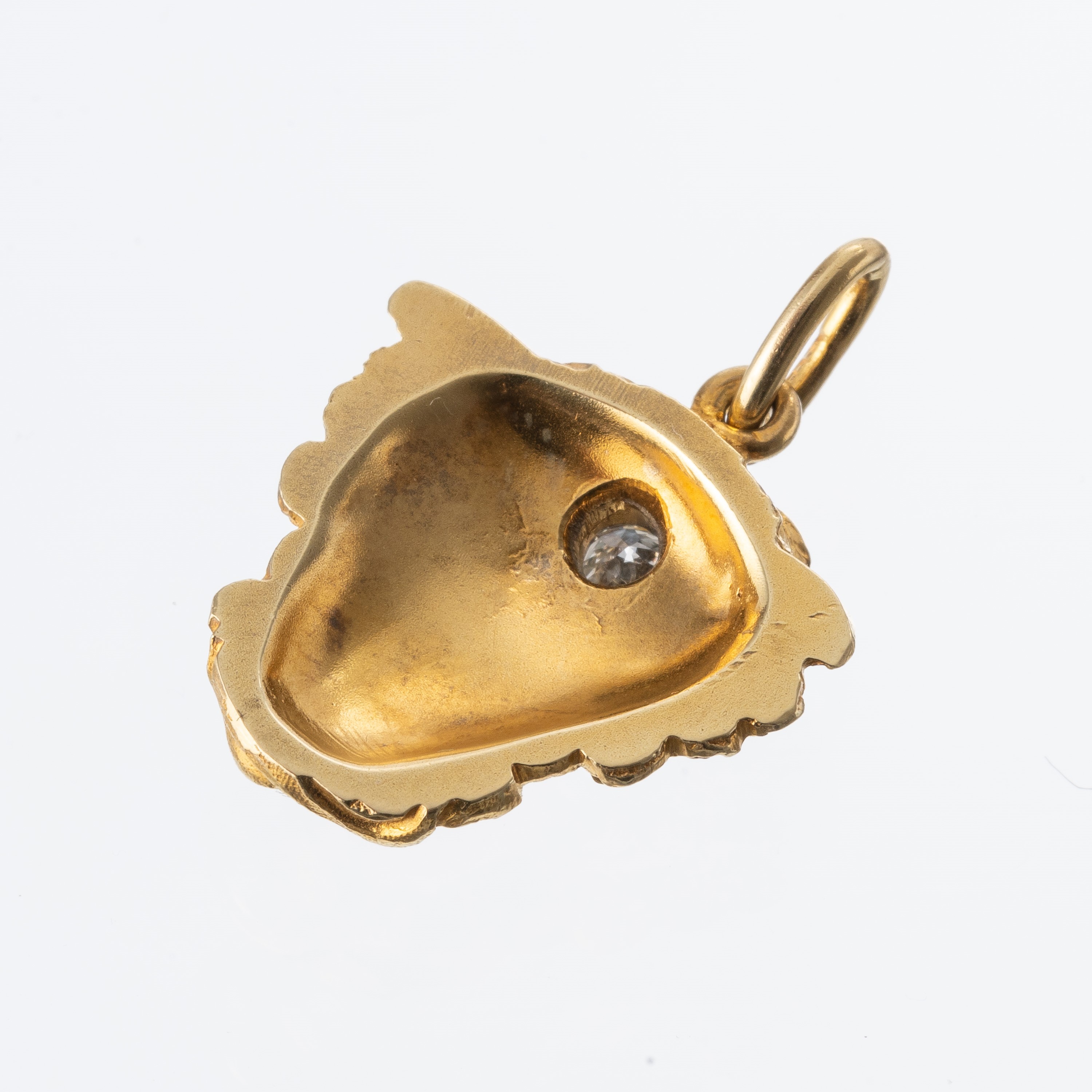 Ciondolo in oro giallo 18 kt con testa di Medusa e diamante ct 0,18 circa
