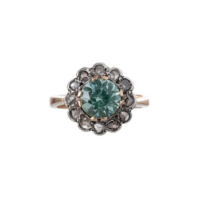 Anello in oro rosa 18 kt e argento con pietra verde sintetica centrale e contorno a rosette diama...