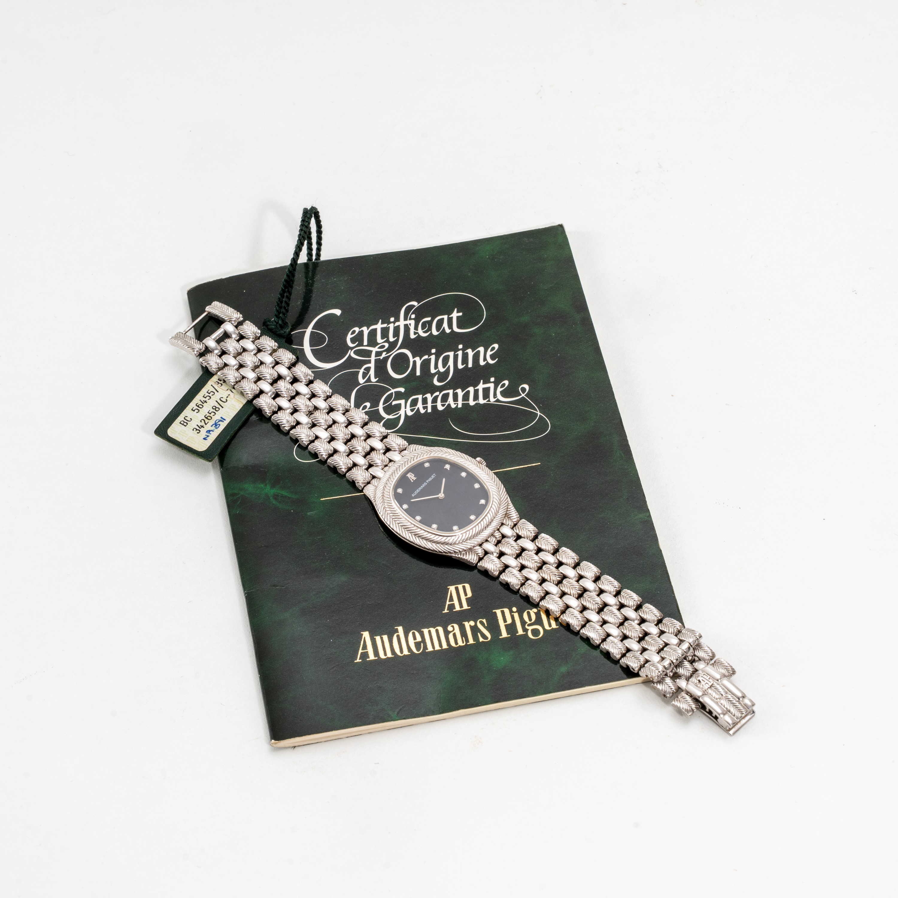 Audemars Piguet - Feather, orologio solo tempo in oro bianco 18kt con bracciale integrato