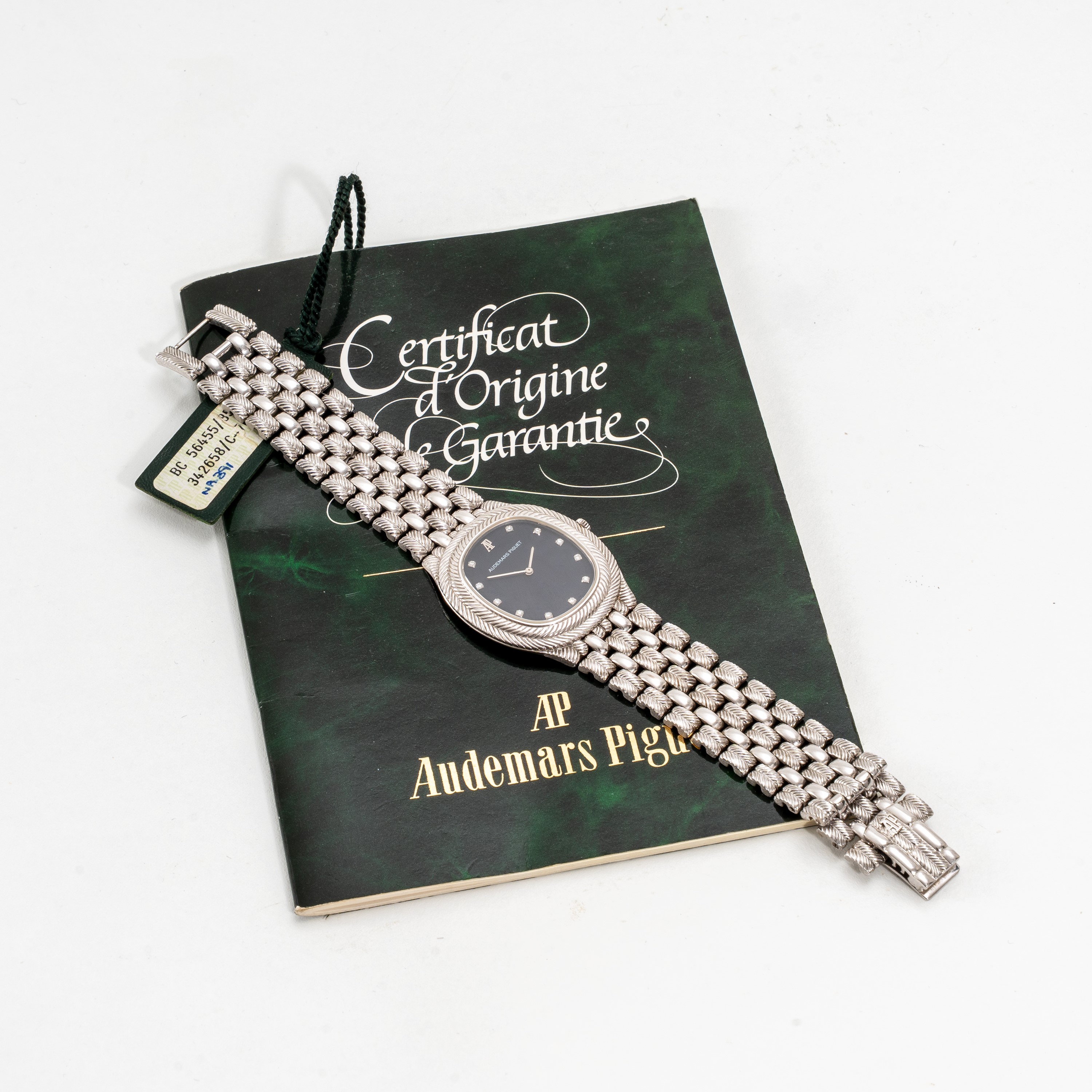 Audemars Piguet - Feather, orologio solo tempo in oro bianco 18kt con bracciale integrato