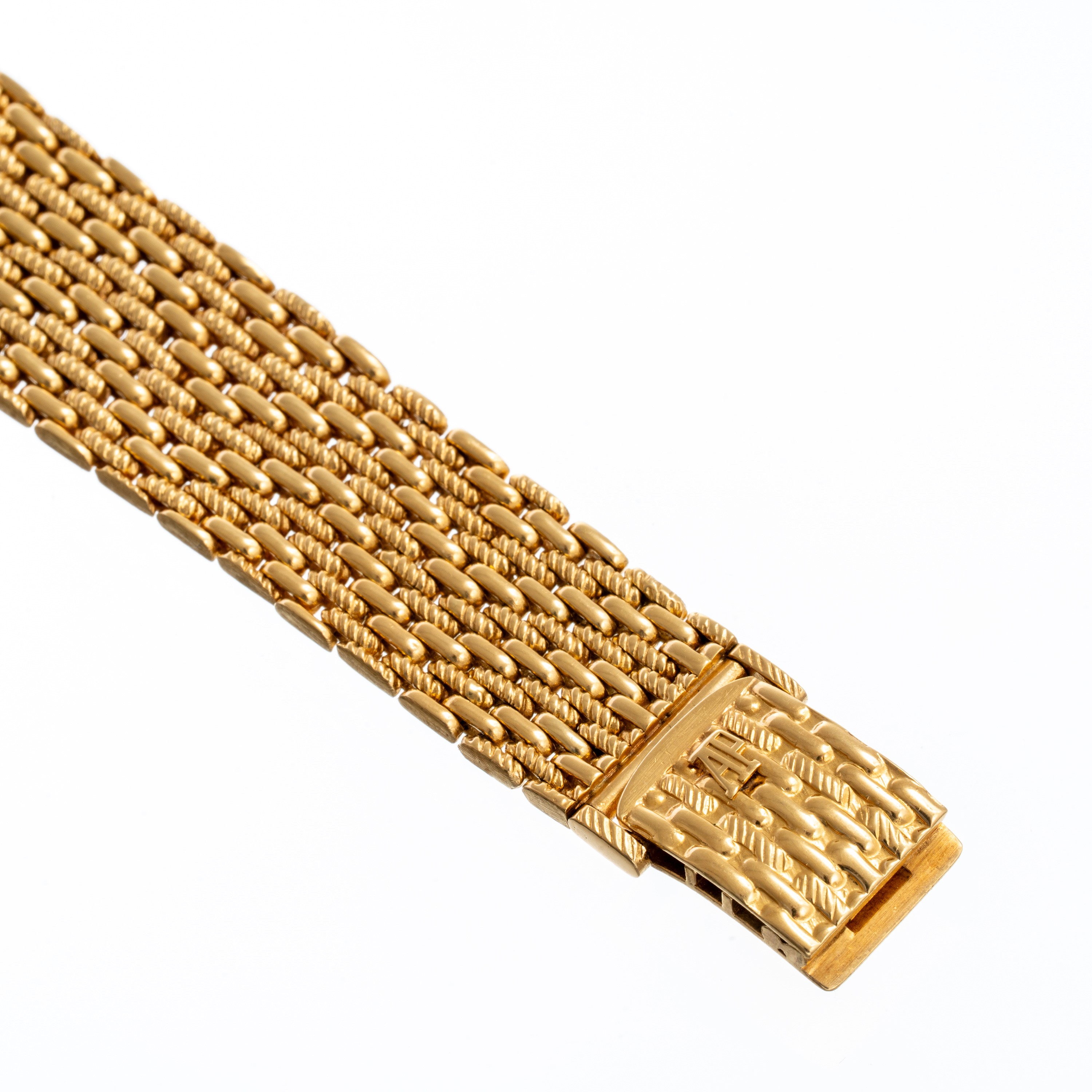 Audemars Piguet - Orologio solo tempo a carica manuale in oro giallo 18 kt con bracciale integrat...