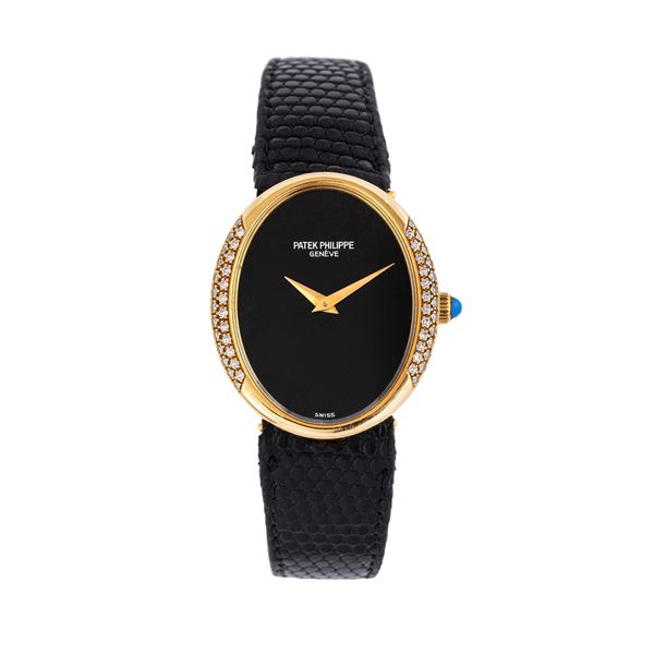 PATEK PHILIPPE - PATEK PHILIPPE - ELLIPSE LADY OROLOGIO SOLO TEMPO A CARICA MANUALE IN ORO GIALLO 18KT CON QUADRANTE IN ONICE E GHIERA IN DIAMANTI TAGLIO BRILLANTE