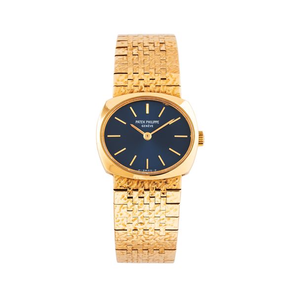 PATEK PHILIPPE - PATEK PHILIPPE - ELLIPSE OROLOGIO SOLO TEMPO A CARICA MANUALE IN ORO GIALLO 18KT CON BRACCIALE INTEGRATO LAVORATO IN ORO GIALLO 18KT E QUADRANTE BLU SIGMA
