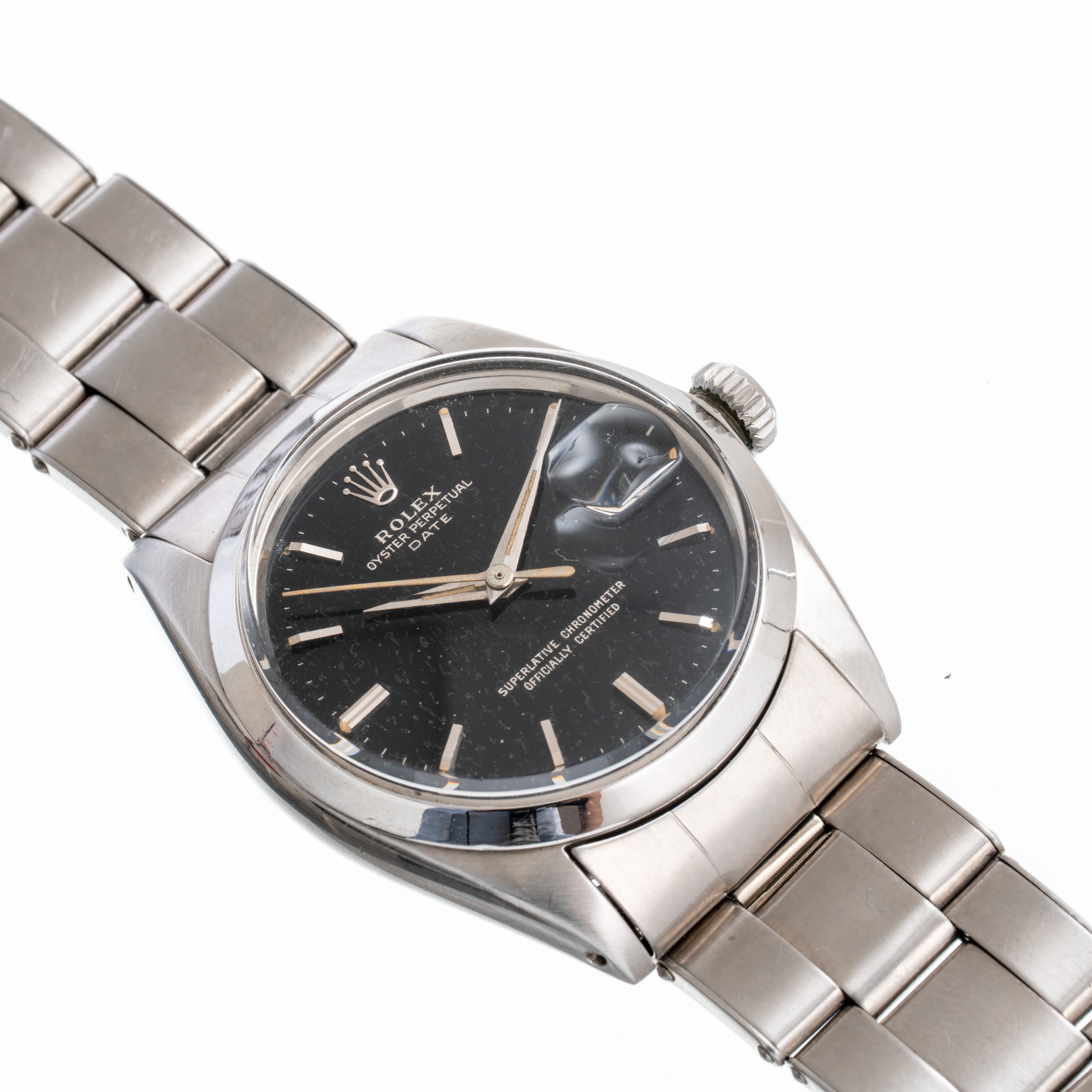 Rolex, Rolex - Oyster Perpetual Date Ref. 1500, orologio automatico con quadrante nero gilt e dat...