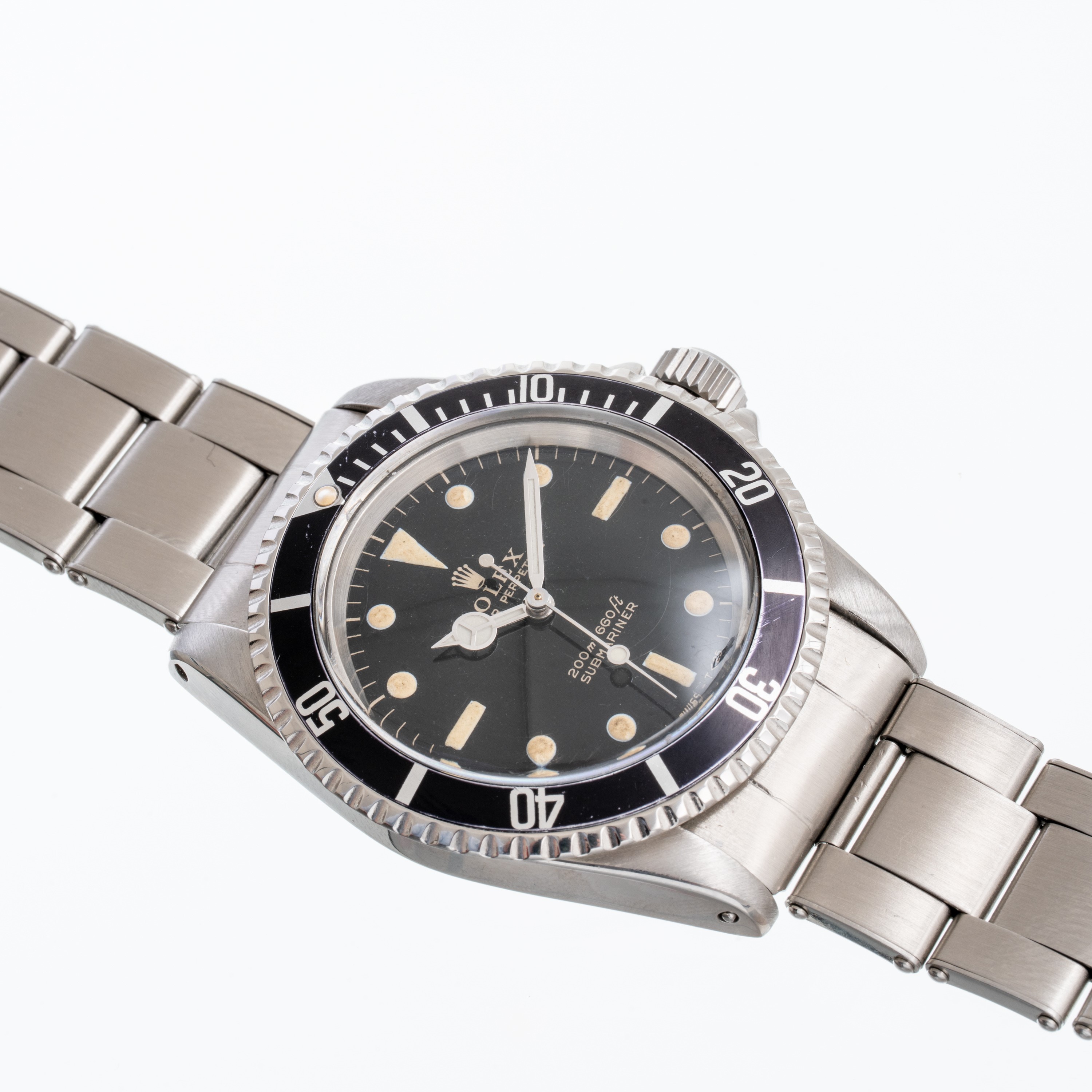 Rolex - Submariner Ref. 5513, orologio subacqueo automatico in acciaio con quadrante nero gilt