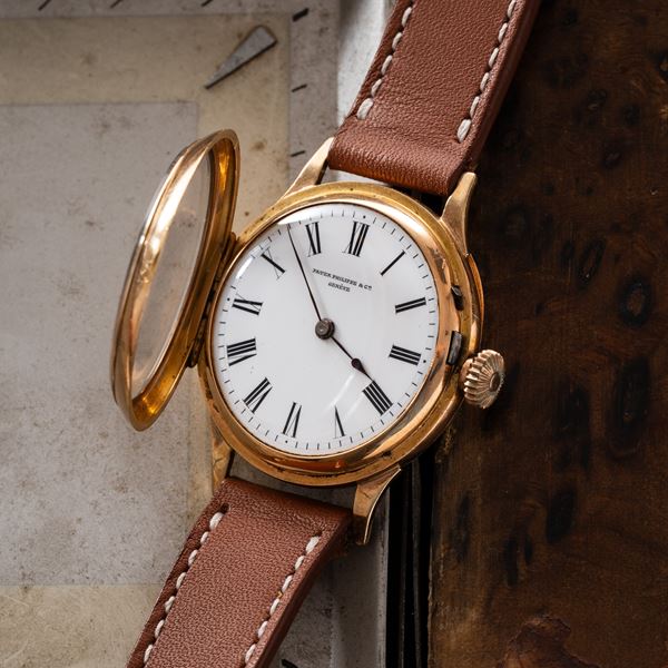 PATEK PHILIPPE - PATEK PHILIPPE  OROLOGIO SOLO TEMPO A CARICA MANUALE IN ORO ROSA 18KT CON CASSA A CERNIERA E QUADRANTE PORCELLANA