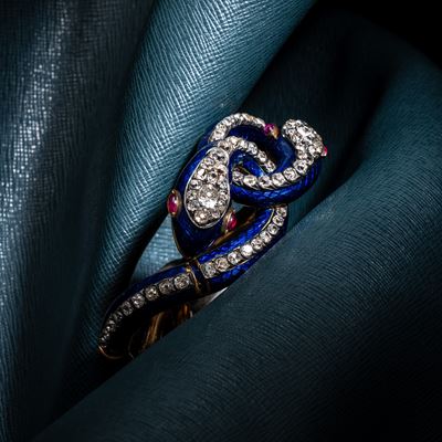 Bracciale a forma di serpente in oro giallo 18 kt con smalti e diamanti