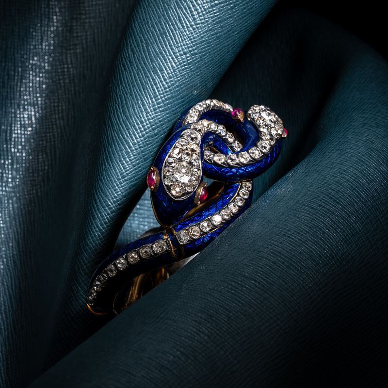 Bracciale a forma di serpente in oro giallo 18 kt con smalti e diamanti