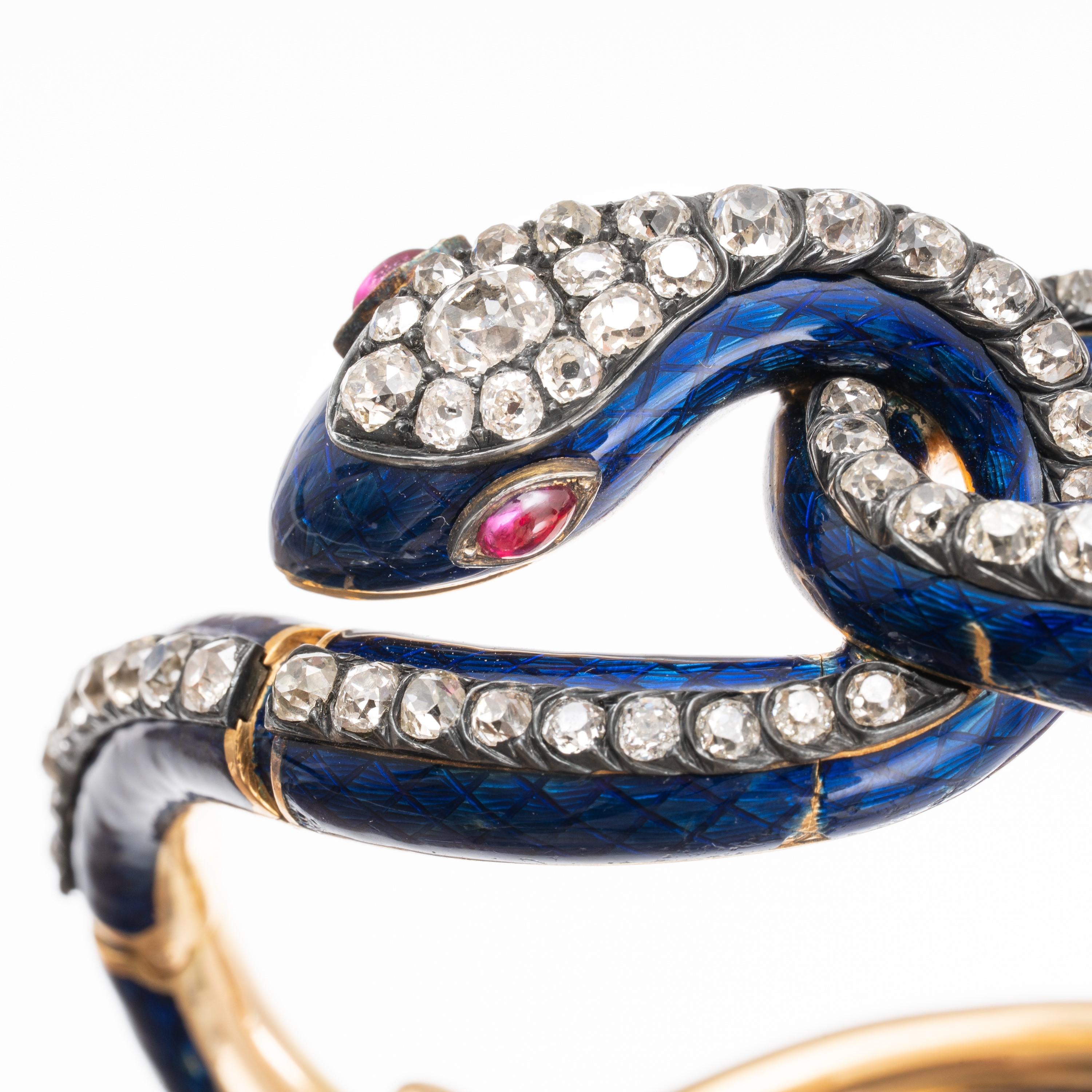 Bracciale a forma di serpente in oro giallo 18 kt con smalti e diamanti