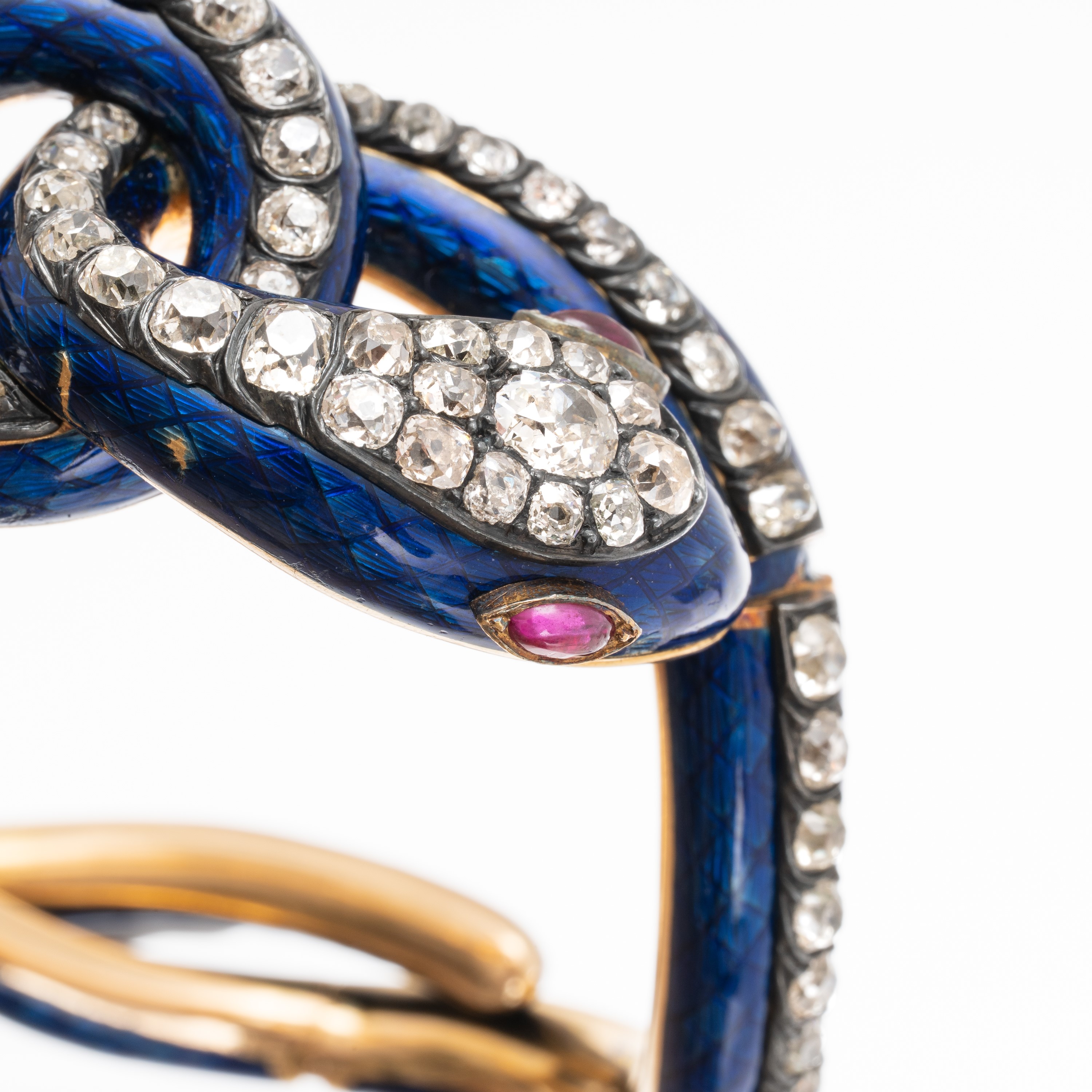 Bracciale a forma di serpente in oro giallo 18 kt con smalti e diamanti