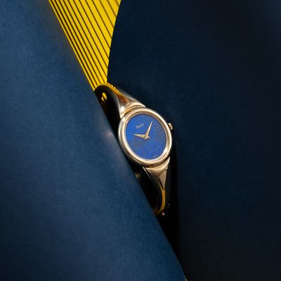 Orologio solo tempo a carica manuale in oro giallo 18 kt con quadrante in lapislazzuli