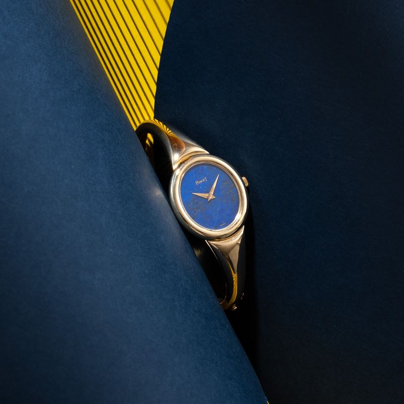 Piaget - Orologio solo tempo a carica manuale in oro giallo 18 kt con quadrante in lapislazzuli