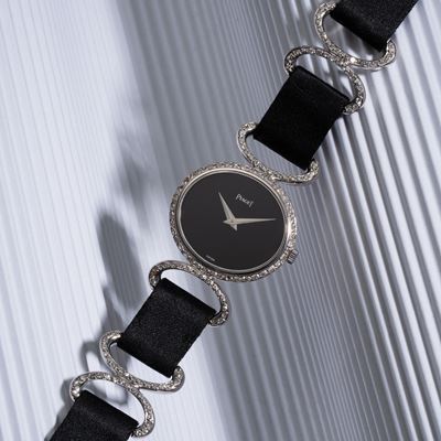 Orologio solo tempo a carica manuale in oro bianco 18 kt con diamanti e quadrante in onice
