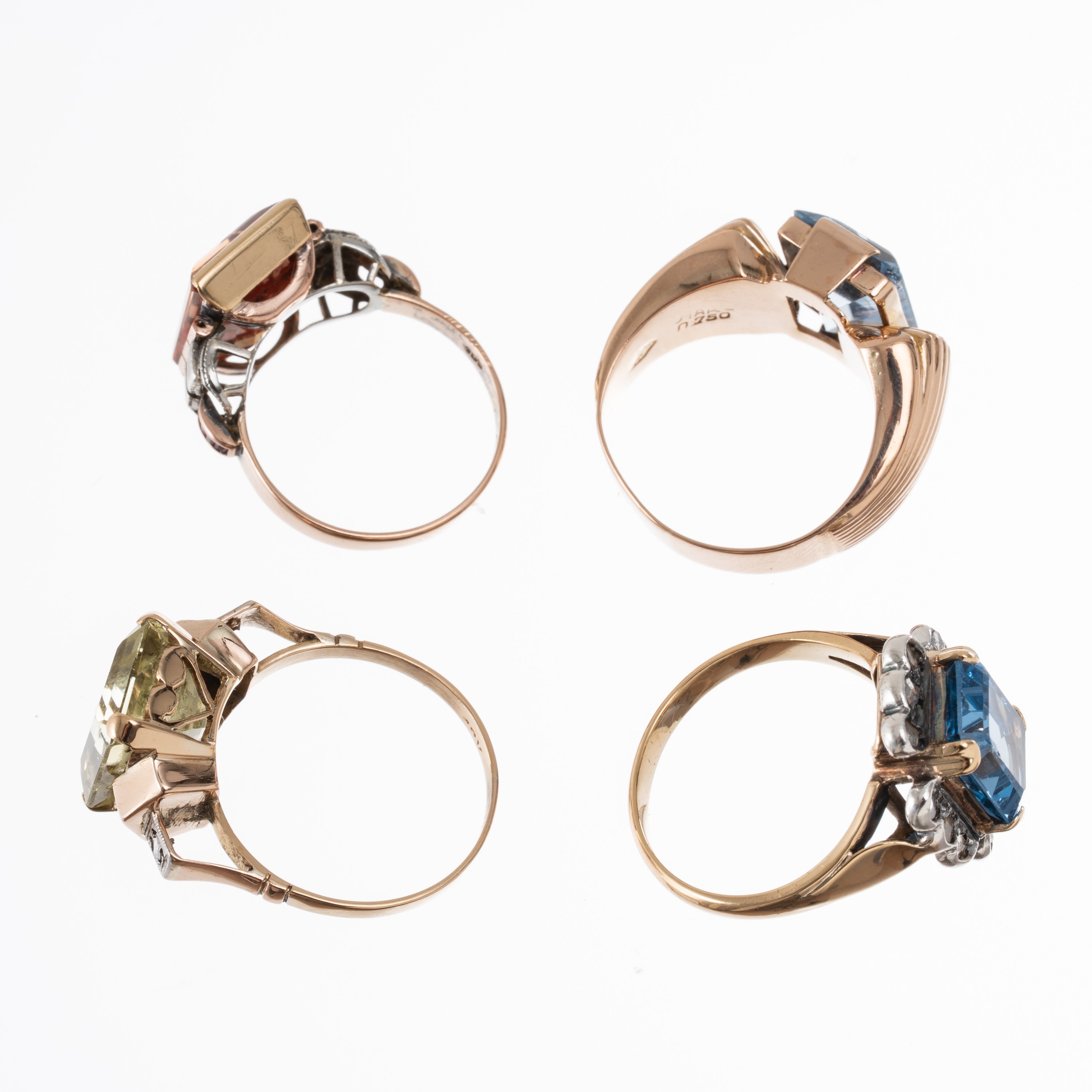Anelli in oro 18 kt, otto pezzi con pietre colorate e inserti diamantati