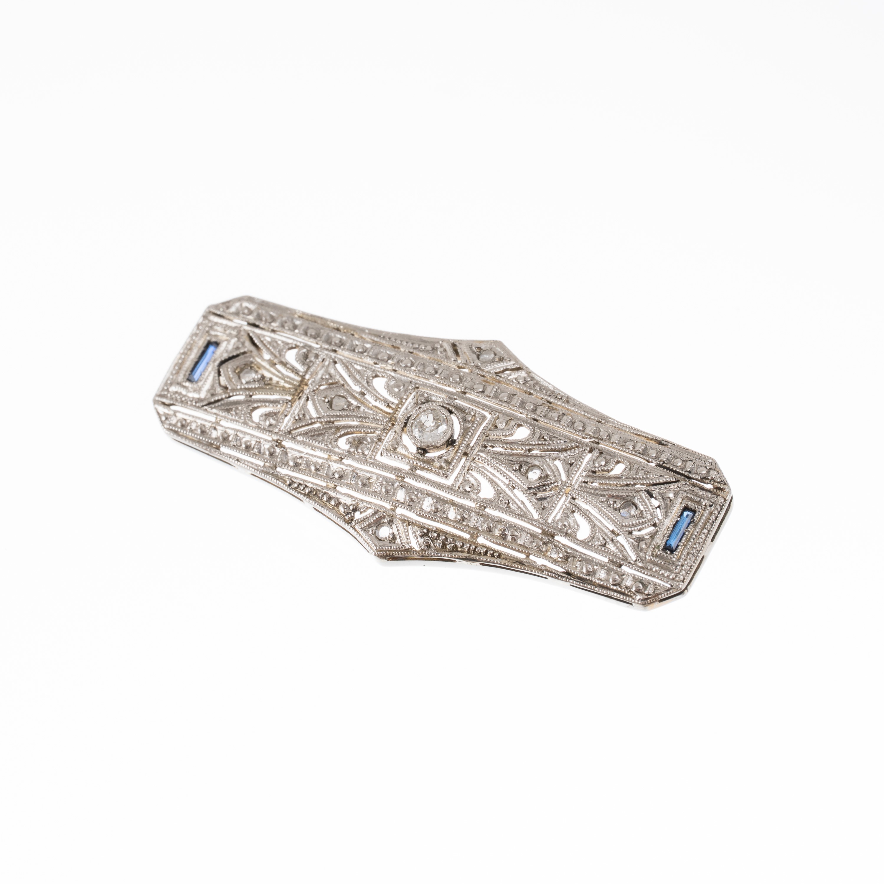 Spilla in oro bianco 18 kt con diamante centrale e sei rosette di diamanti