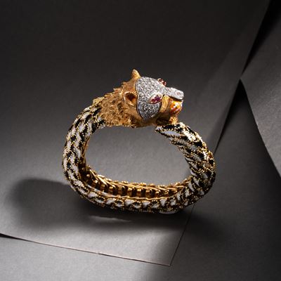 Bracciale ad elementi snodati in oro giallo 18 kt con diamanti, rubini e smalti bianchi e neri