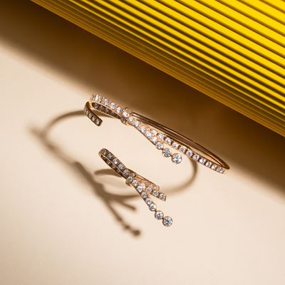 Parure “Ruban” in oro beige 18 kt con diamanti