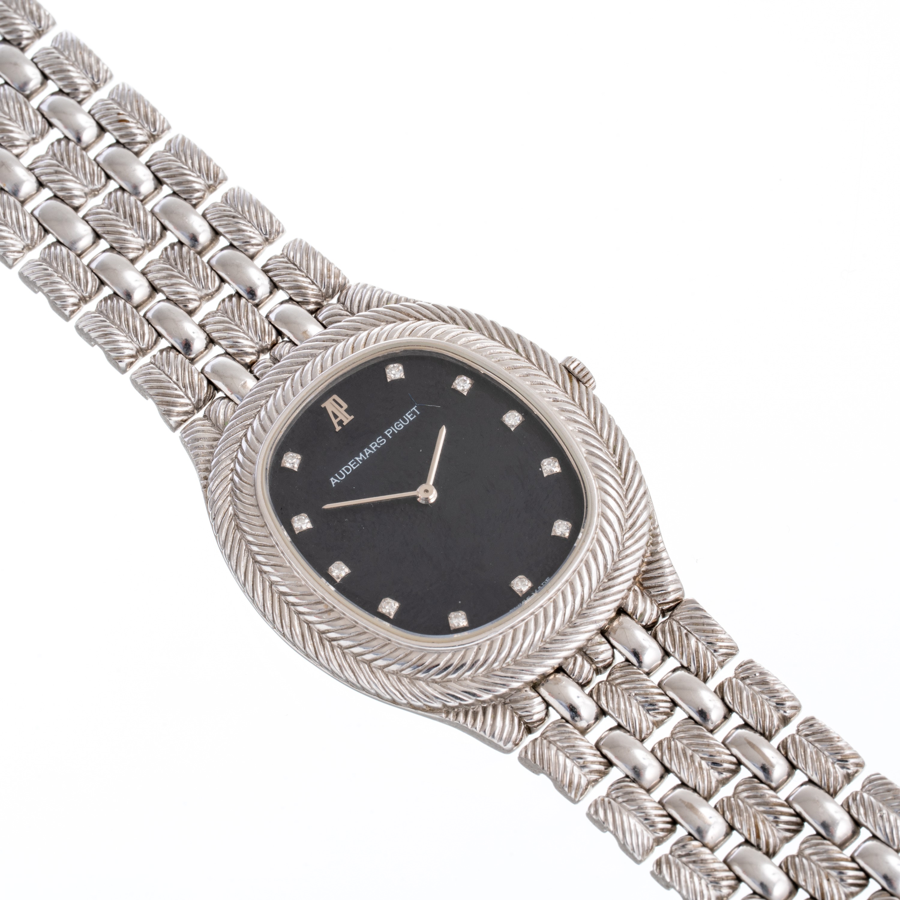 Audemars Piguet - Feather, orologio solo tempo in oro bianco 18 kt con bracciale integrato