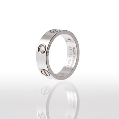 Anello “Love” in oro bianco 18 kt con tre diamanti taglio brillante